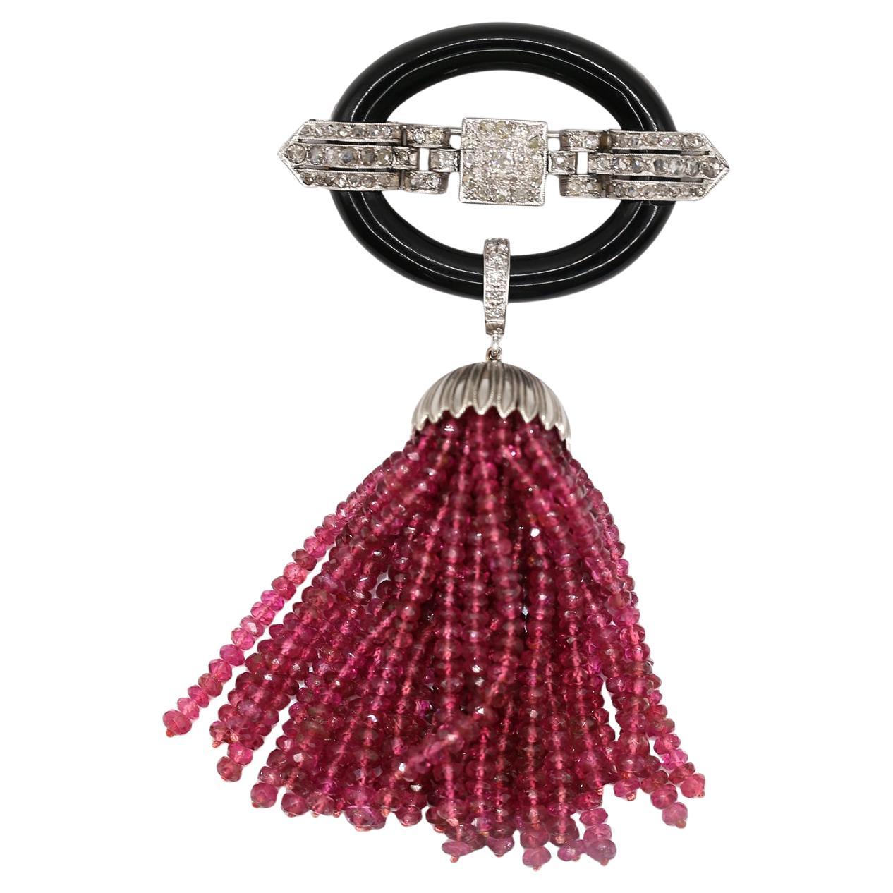 Pendentif broche Art déco en onyx noir et diamants taillés en rose, platine et rubis, 1900