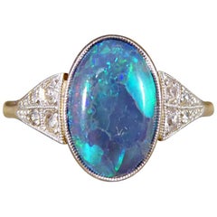 Art Deco Black Opal Ring with Diamond Shoulders in 18 Carat Gold and Platinum