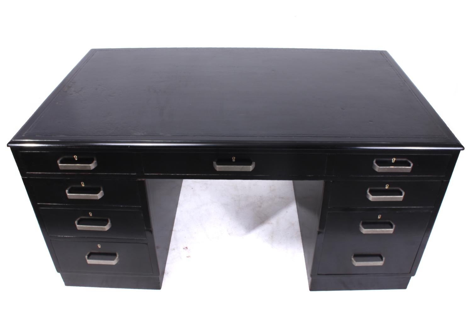 Art Deco black piano lacquer desk
A good quality Art Deco piano lacquer desk with eight drawers steel handles and original hyde leather top, the desk has been restored and French polished and the original leather has been saved it is a one piece