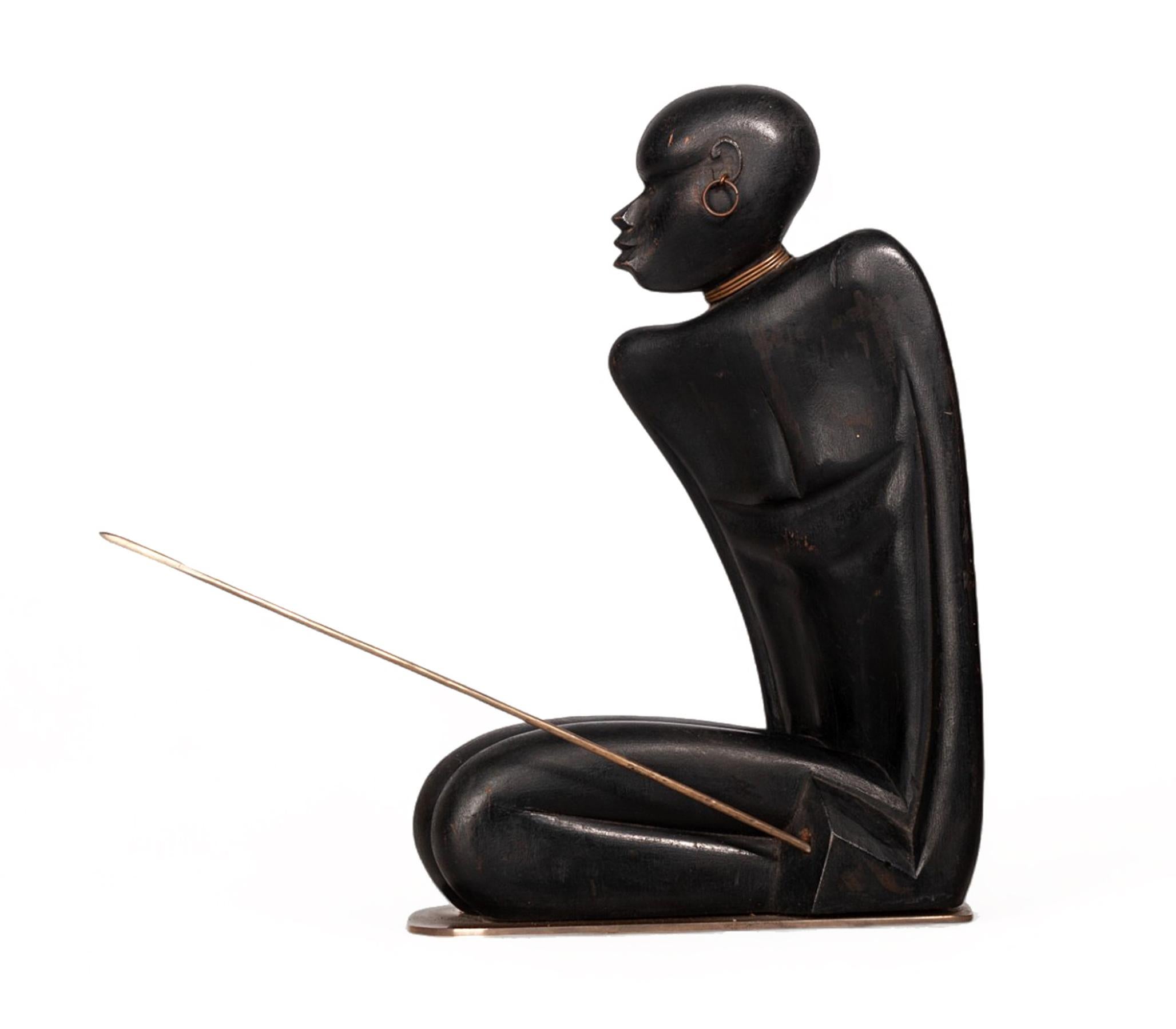 Early 20th century Art Déco black wood sculpture of an African warrior with a spear by Karl Hagenauer (Werkstätte Hagenauer Wien), Austria

By: Karl Hagenauer, Werkstätte Hagenauer Wien
Material: bronze, copper, metal, wood, paint
Technique: cast,