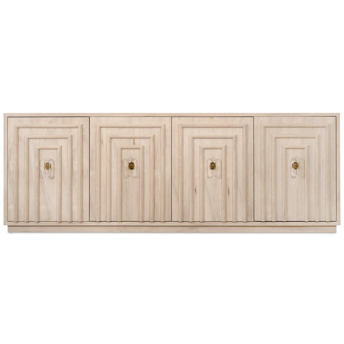 Elegant and symmetrical, the Art Deco Credenza is a modern twist on the classic art deco styling. It's 4 square trellis doors and bleached walnut finish make this piece classic and stunning. The Lucite and brass oval hardware pulls add a modern