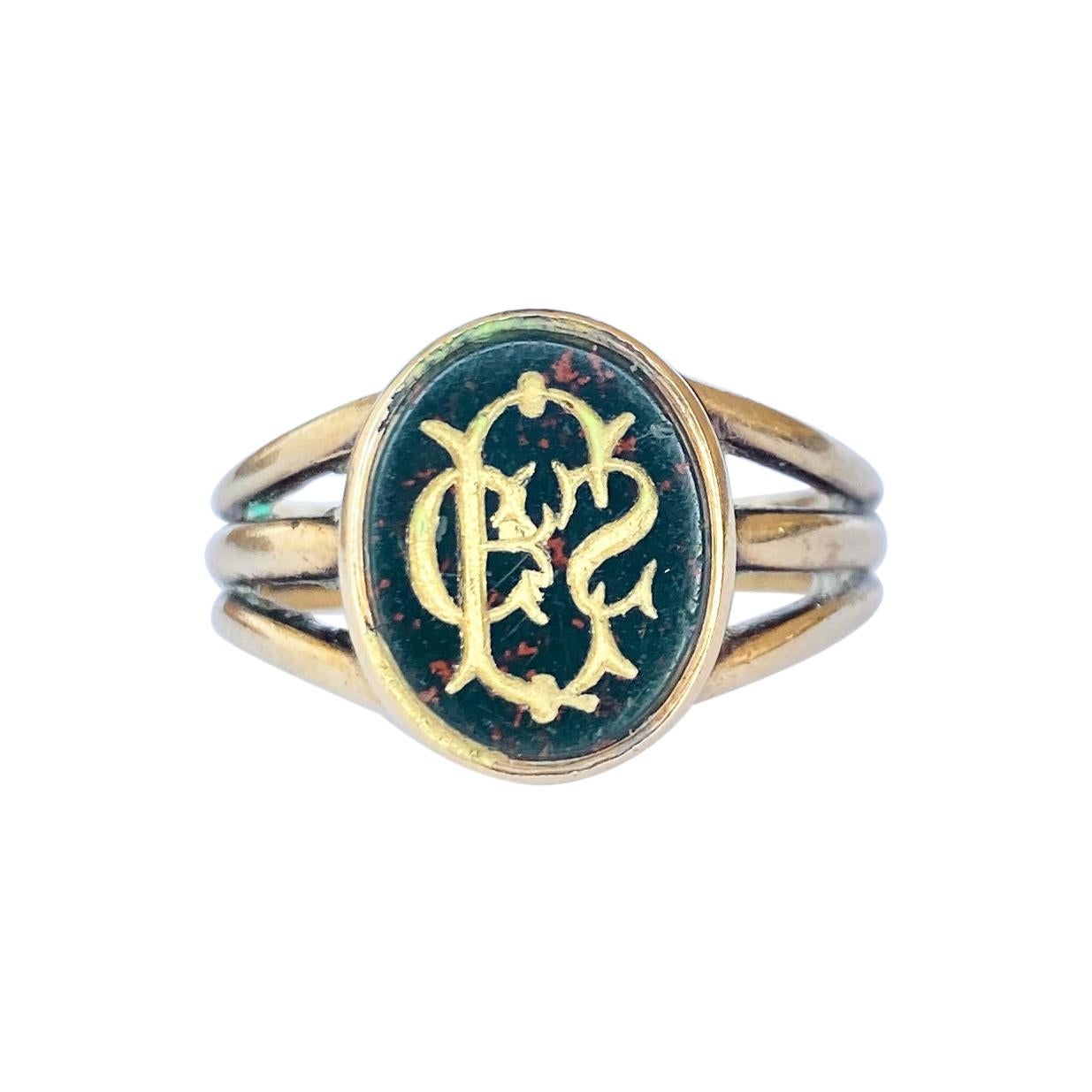 Anello con pietra sanguigna e oro 18 carati inciso Art Deco