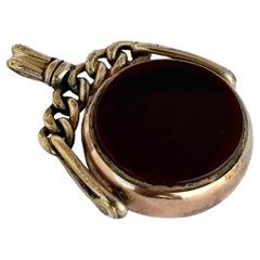 Portafortuna Art Deco in pietra sanguigna e corniola d'oro 9 carati