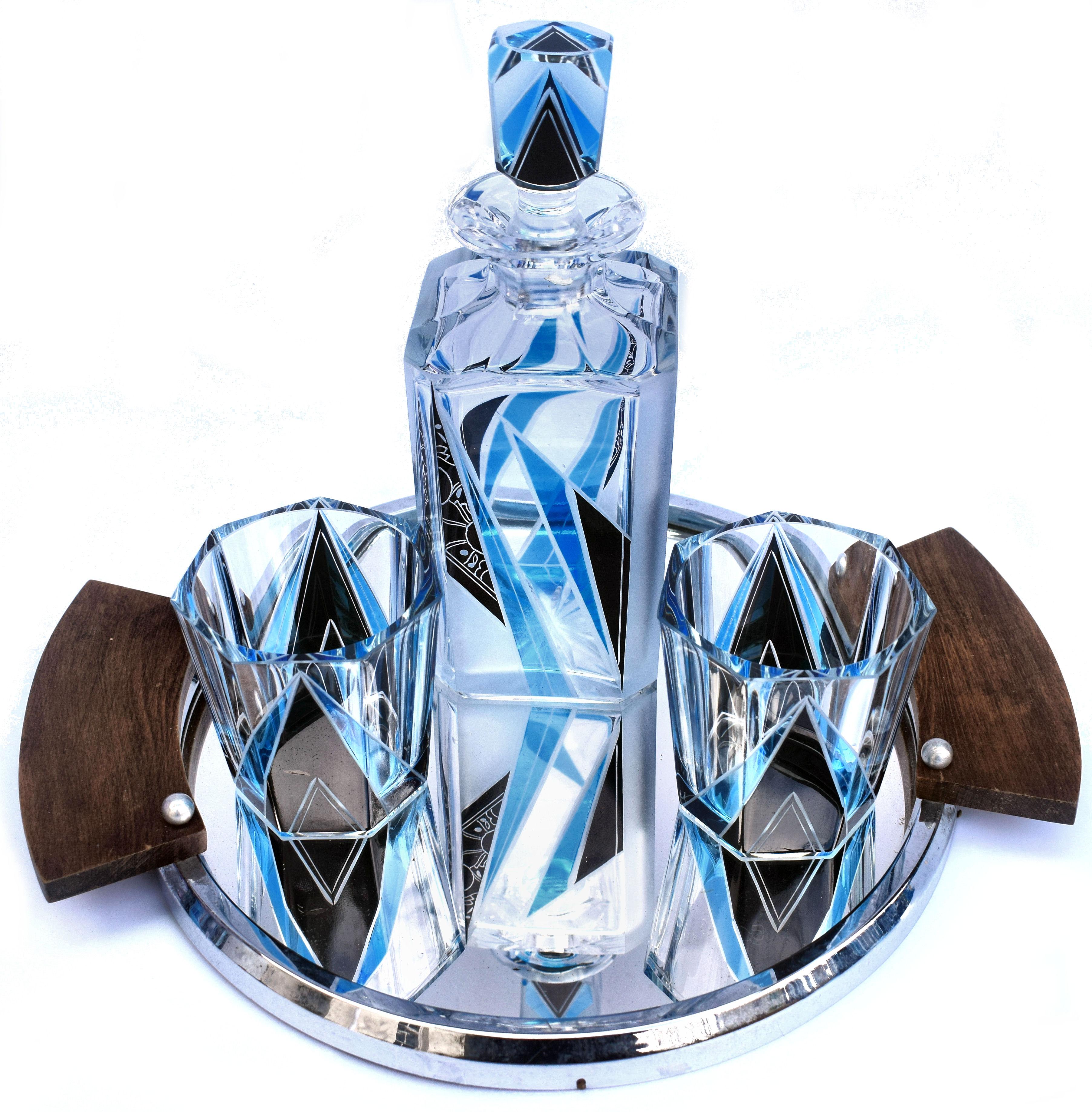 Very high quality, collectable 1930s Art Deco Czech whisky decanter set in heavy cut glass. Originating from Czech Republic this striking set has a very desirable geometric pattern in a rich blue with black overlay enamel decoration. No chips,