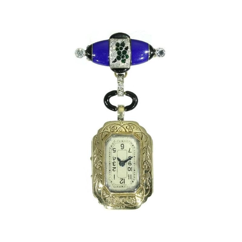 This 14K bi-colour gold watch suspending as a pendant from a matching brooch is enhanced into an authentic Art Deco emblem by its geometrical blue and black enamelled patterns. In between the stylish tincture, a green with black enamelled flower