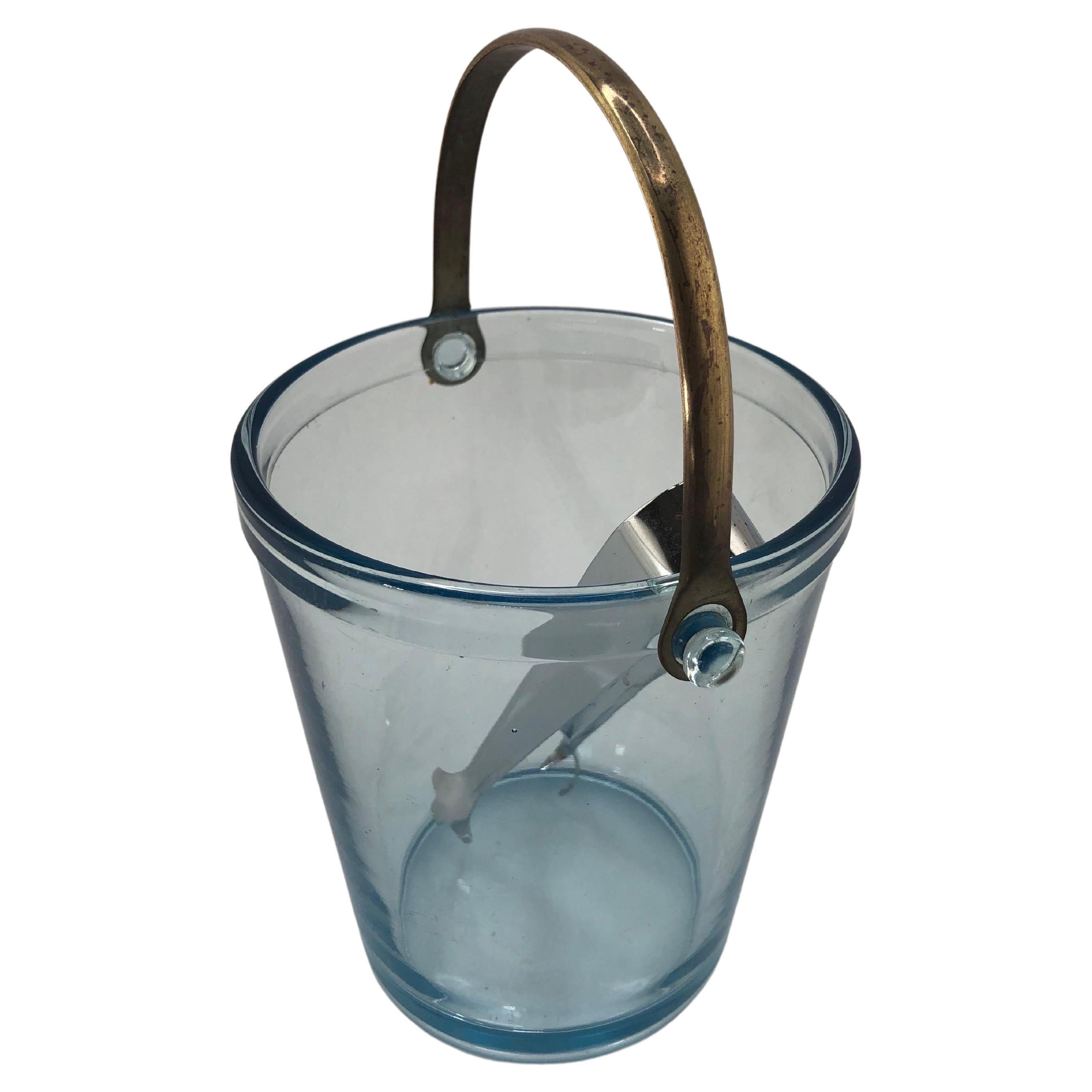 Art Deco Blue Glass Ice Bucket with chrome handle and ice tongs.