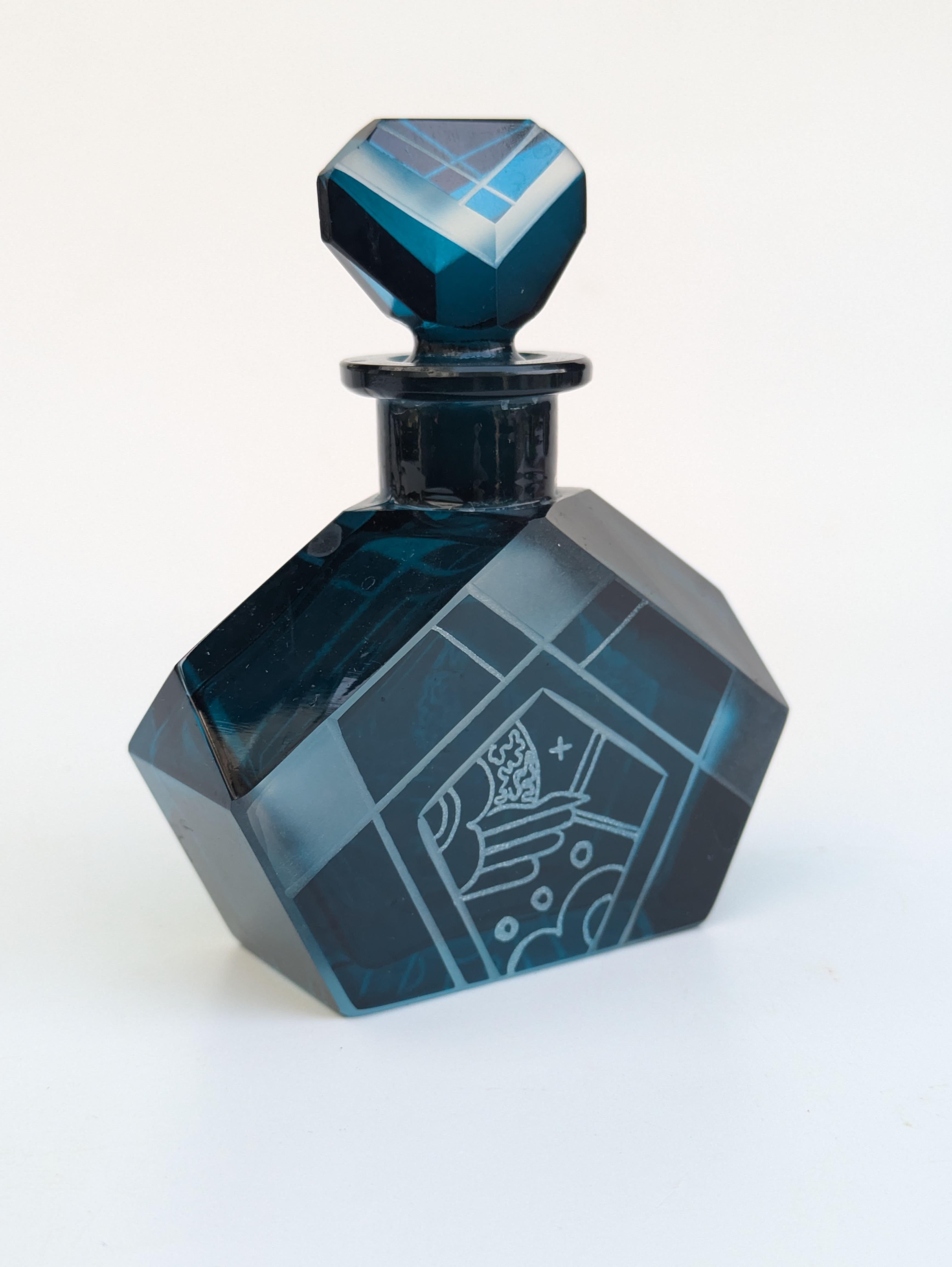 Beautiful Art Deco Czech perfume atomiser dating from the 1930s. These size bottles are very hard to come by and so we were delighted to have found this one.  Superbly stylish blue glass with typical Karl Palda design in enamel. Offered with no