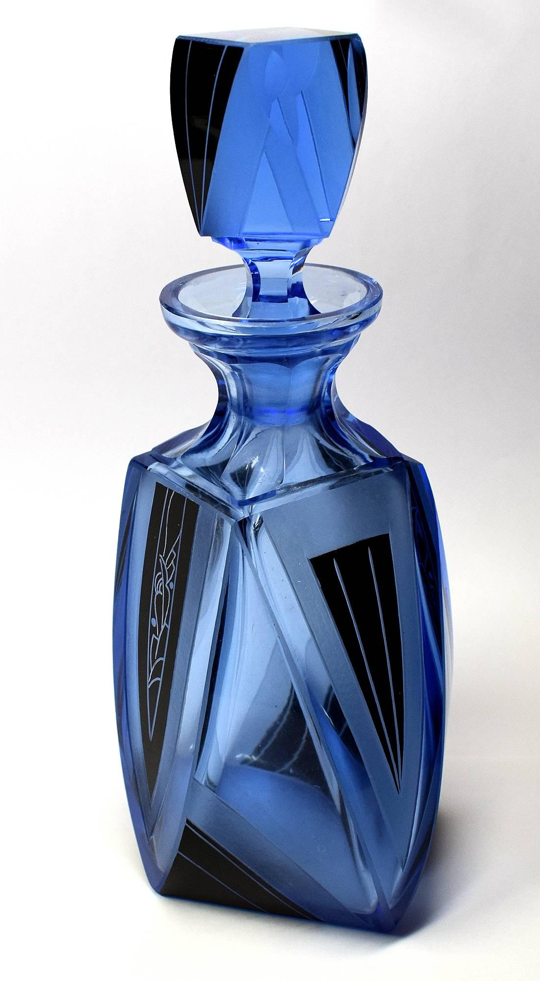 Very high quality, and collectible Art Deco Czech glass decanter set in a rich blue with black enamel decoration. These classic sets are rare and a beautiful addition to any deco collection. No chips, damage, minimal signs of age. The set comprises