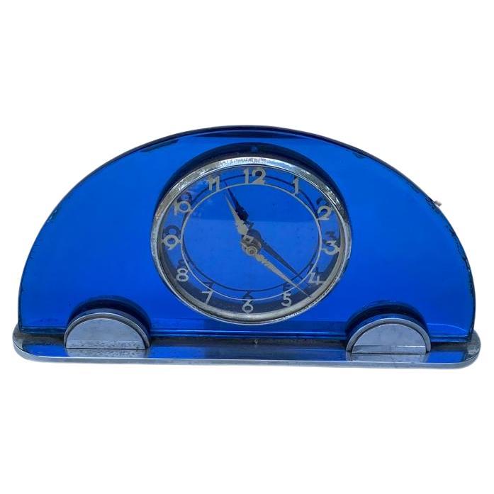 In the 1930's Smiths Sectric produced a range of high end electric clocks with a distinctly Art Deco feel to them. This handsome chap is a surviving example, in a gorgeous colbolt blue colouring. The number dial is chrome, as are the hands, feet &