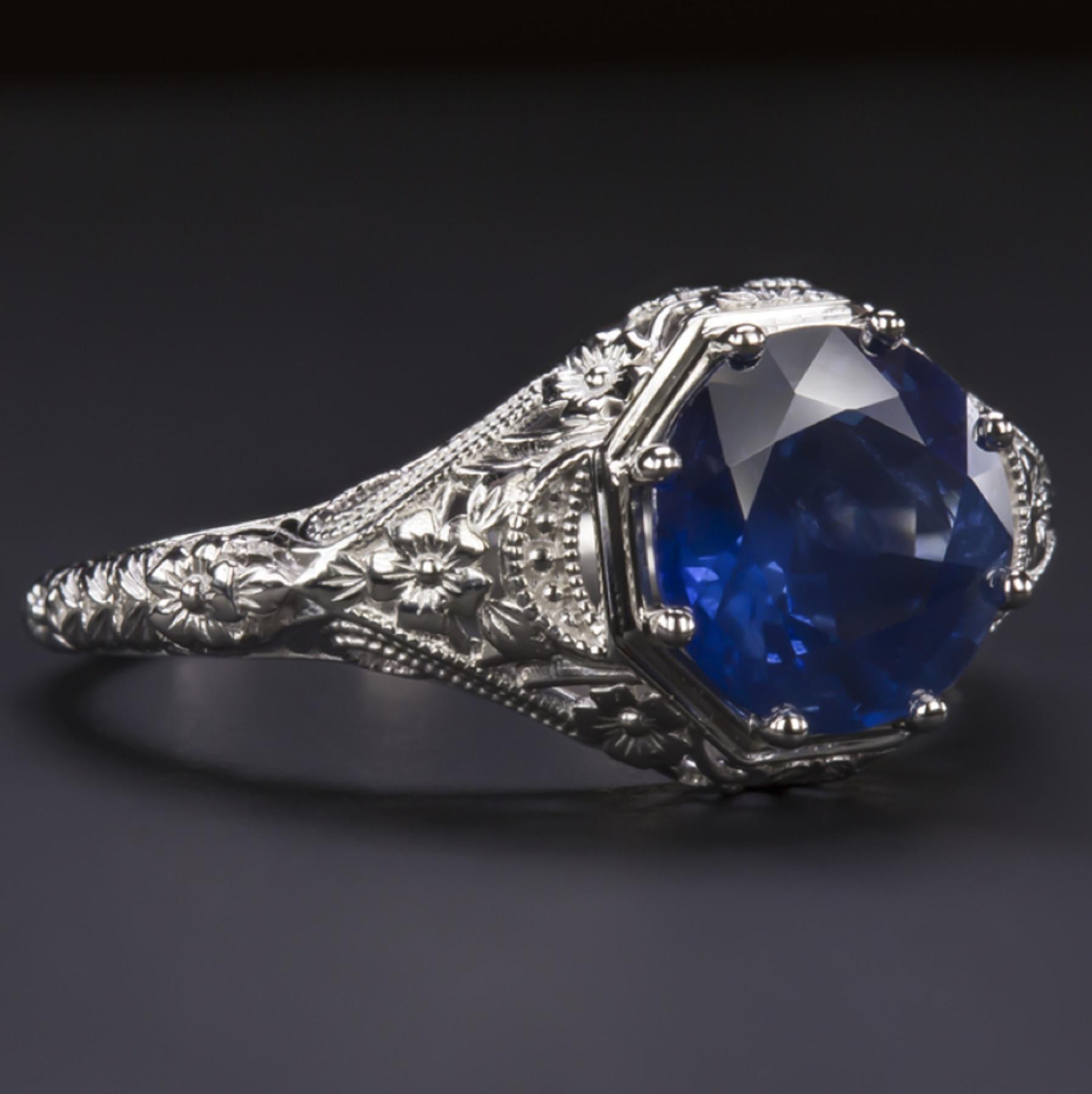 Stunning and high quality sapphire ring offers rich color and a romantic, timeless design! The blue of the 2.38 carat natural sapphire is highly saturated, truly a rich and beautiful color. 

The sapphire has gorgeous brilliance and life with a