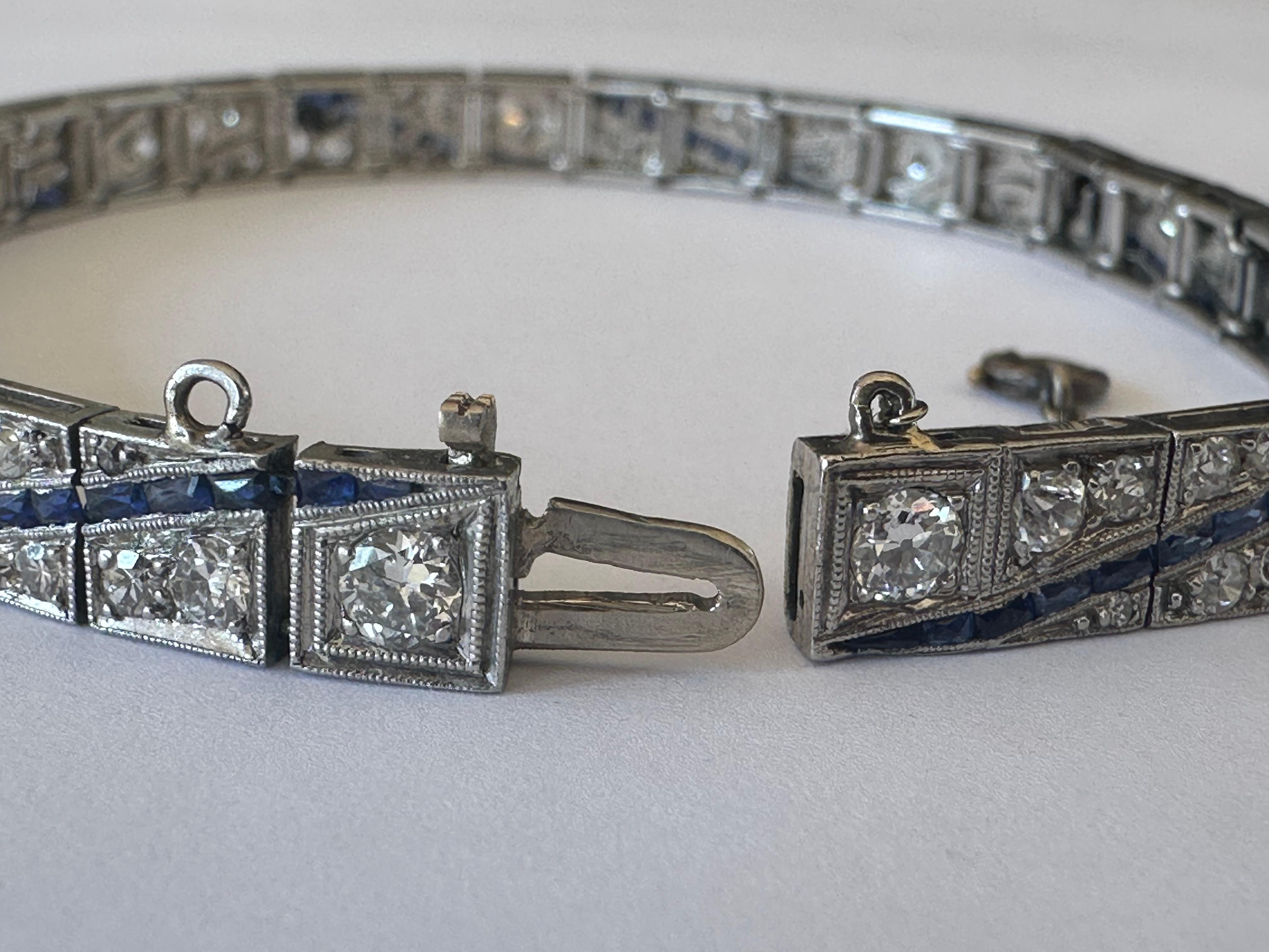 Crafted in the 1920s, this classic Art Deco bracelet features approximately 4.00 carats of Old European cut and single cut diamonds, H color, VS/SI clarity complemented with baguette-shaped calibre-set blue sapphires throughout. Set in platinum. 