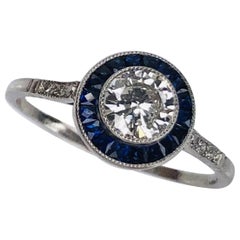 Bague Halo en platine avec saphirs bleus et diamants de style Art Déco
