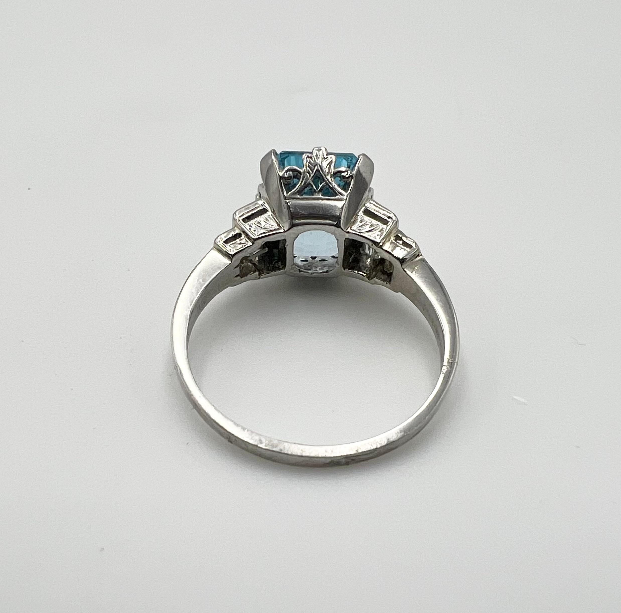 Topaz weight: 3.75ct

Diamond count: 4

Diamond color: E-F

Diamond clarity: VS1-VS2

Diamond weight: .36ct

Ring size: 7

Ring weight: 5.3 grams

Condition: excellent