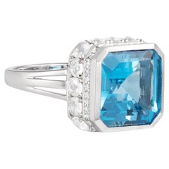 Art Deco Blue Topaz Ring with White Topaz & Diamond in 18 Karat White Gold