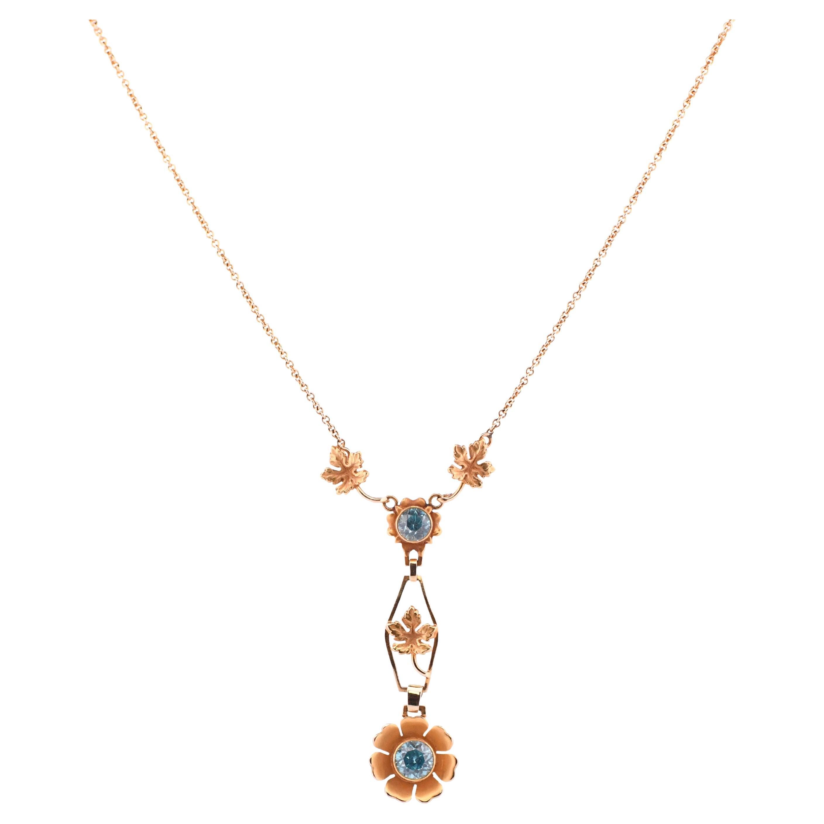 Art Deco Blue Zircon Floral Gold Drop Pendant Necklace For Sale