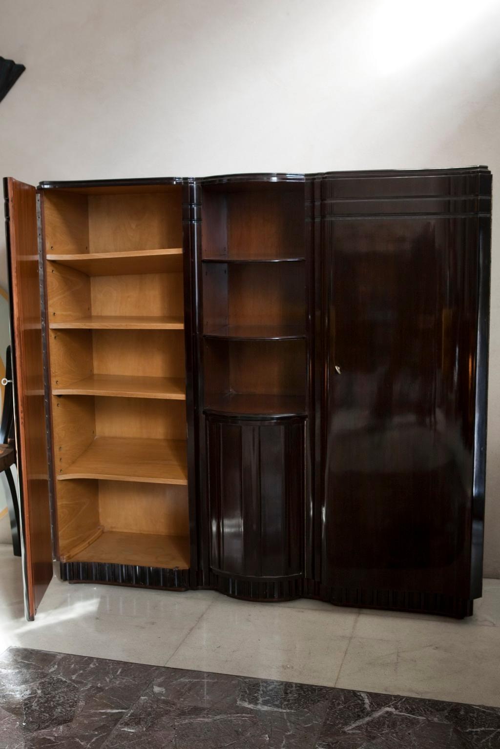 Bookcase with bar, 

Year: 1930
Country: French
Wood 
It is an elegant and sophisticated bookcase.
You want to live in the golden years, this is the bookcase that your project needs.
We have specialized in the sale of Art Deco and Art Nouveau styles