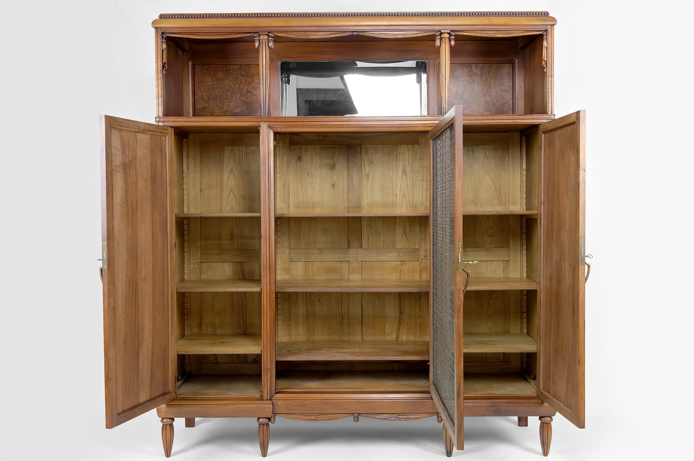 Art Deco bookcase / cabinet / display case in carved walnut, France, circa 1925 12