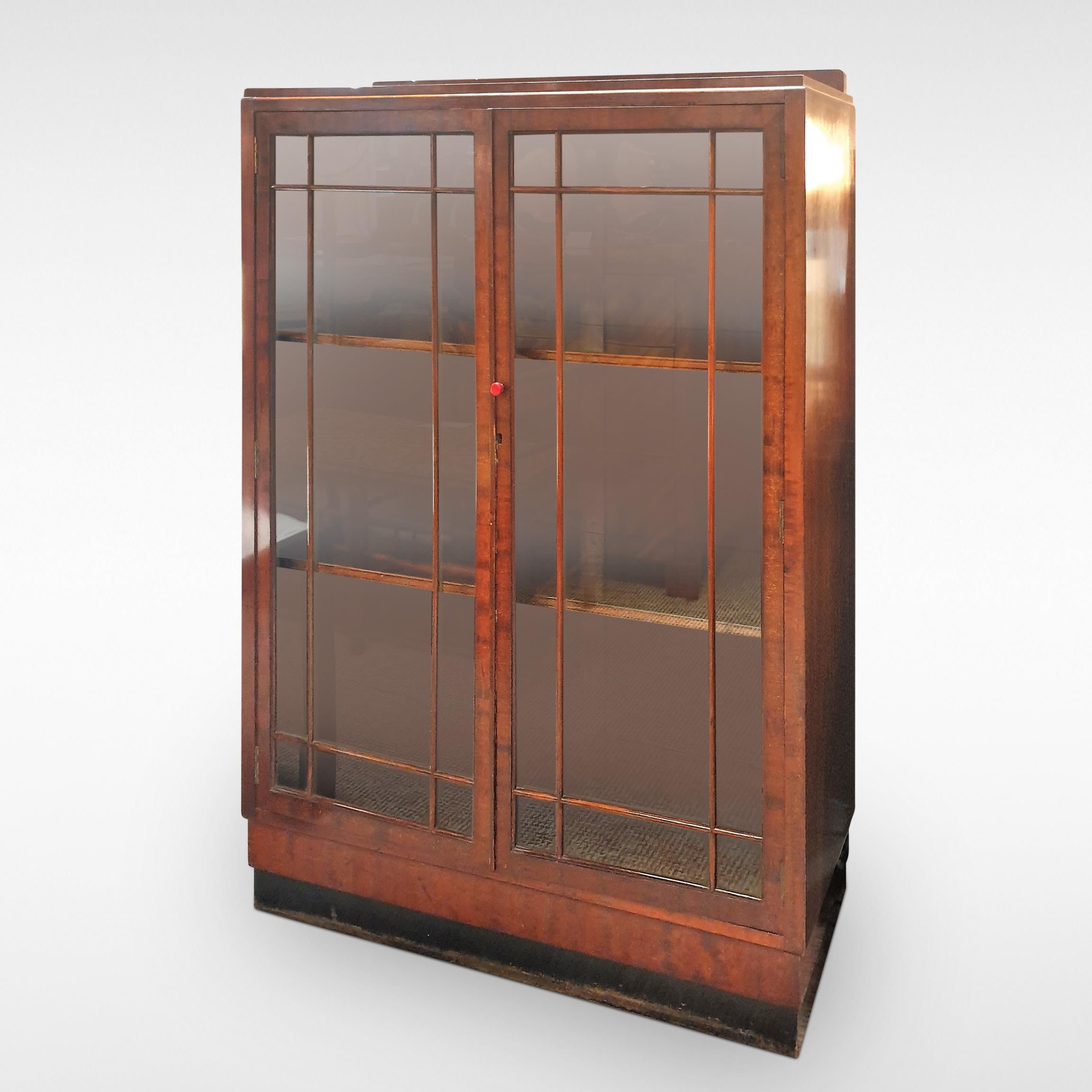 Art Deco glazed Bookcase or Display Cabinet in Mahogany, circa 1935.