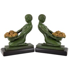 Art Deco Bookends Kneeling Nude with Basket by Max Le Verrier France 1930