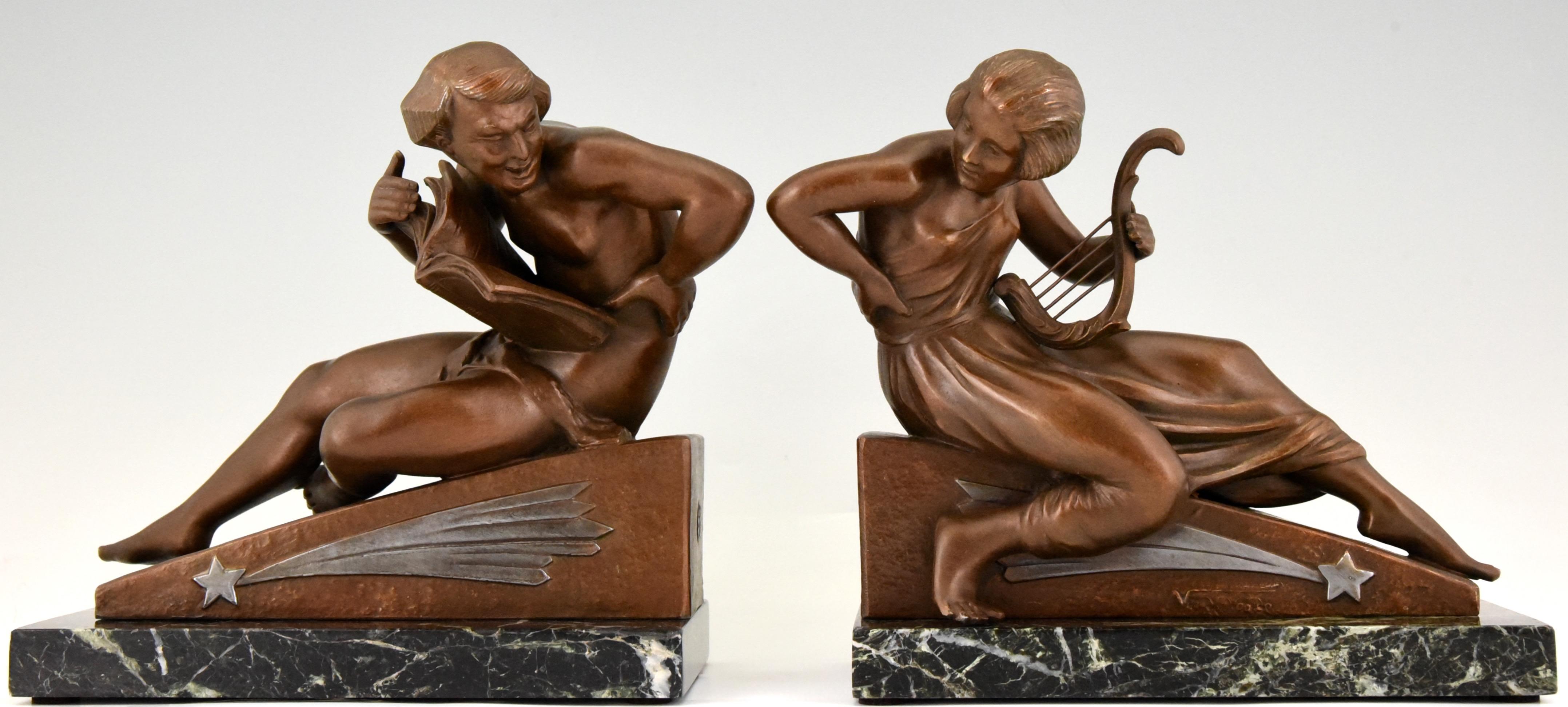 Very tall pair of Art Deco bookends, allegory of music.
Man with music book and woman with lyre by the artist Georges Van de Voorde. Cast at the Brig foundry in Paris. The Art metal sculptures have a lovely brown and silver patina and are mounted