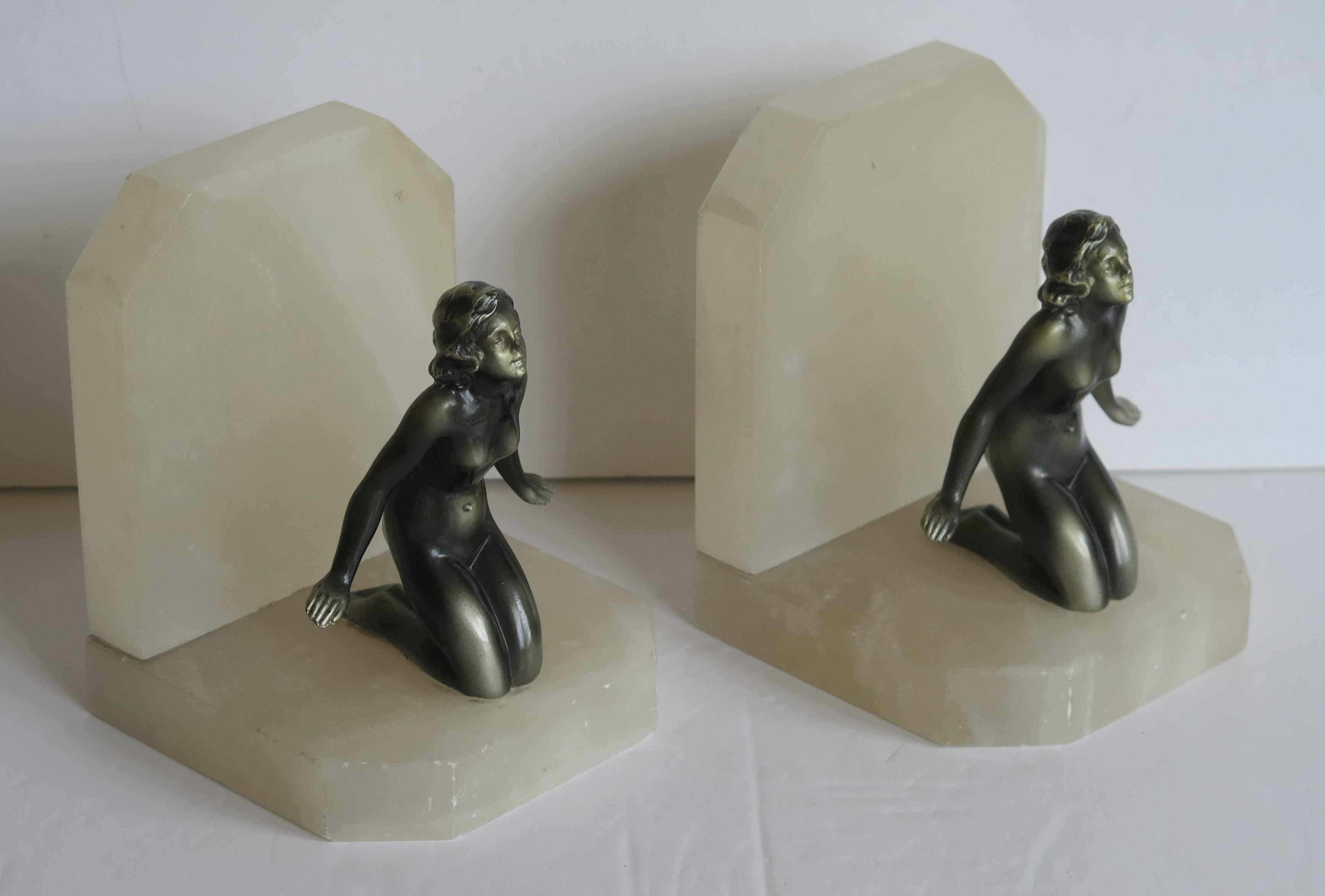 20th Century Art Deco Bookends Metal Lady Figures on Stone Bases, French, circa 1930