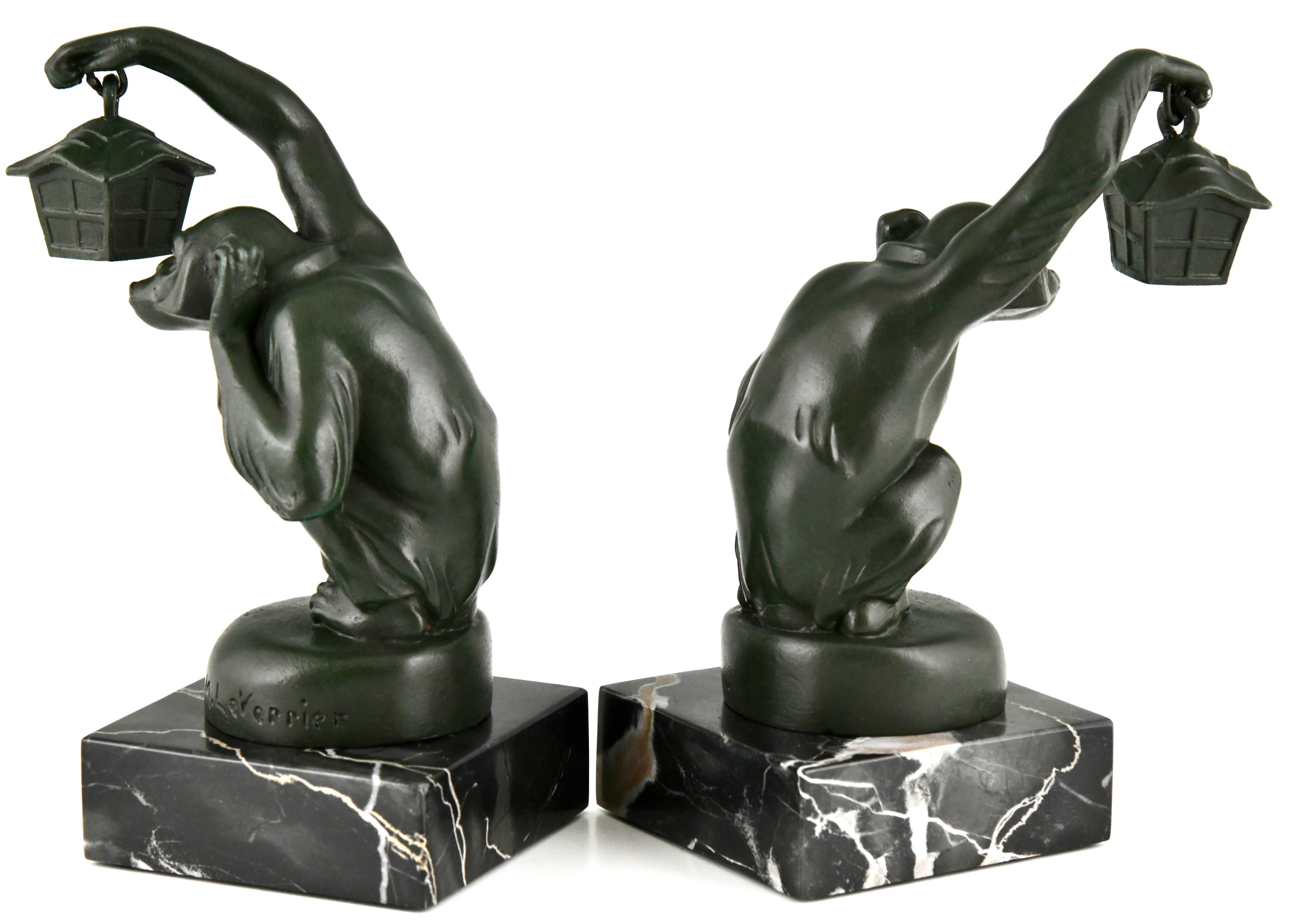 Metal Art Deco Bookends Monkey with Lantern by Max Le Verrier 1925 For Sale