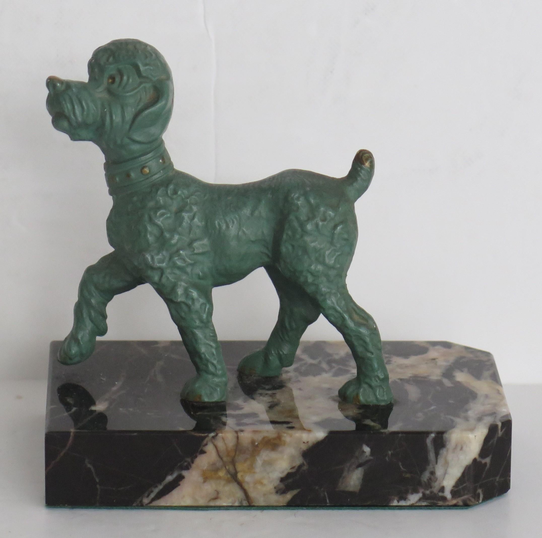 20th Century Art Deco Bookends of Poodle Dogs Spelter on Portoro Marble Bases, circa 1930