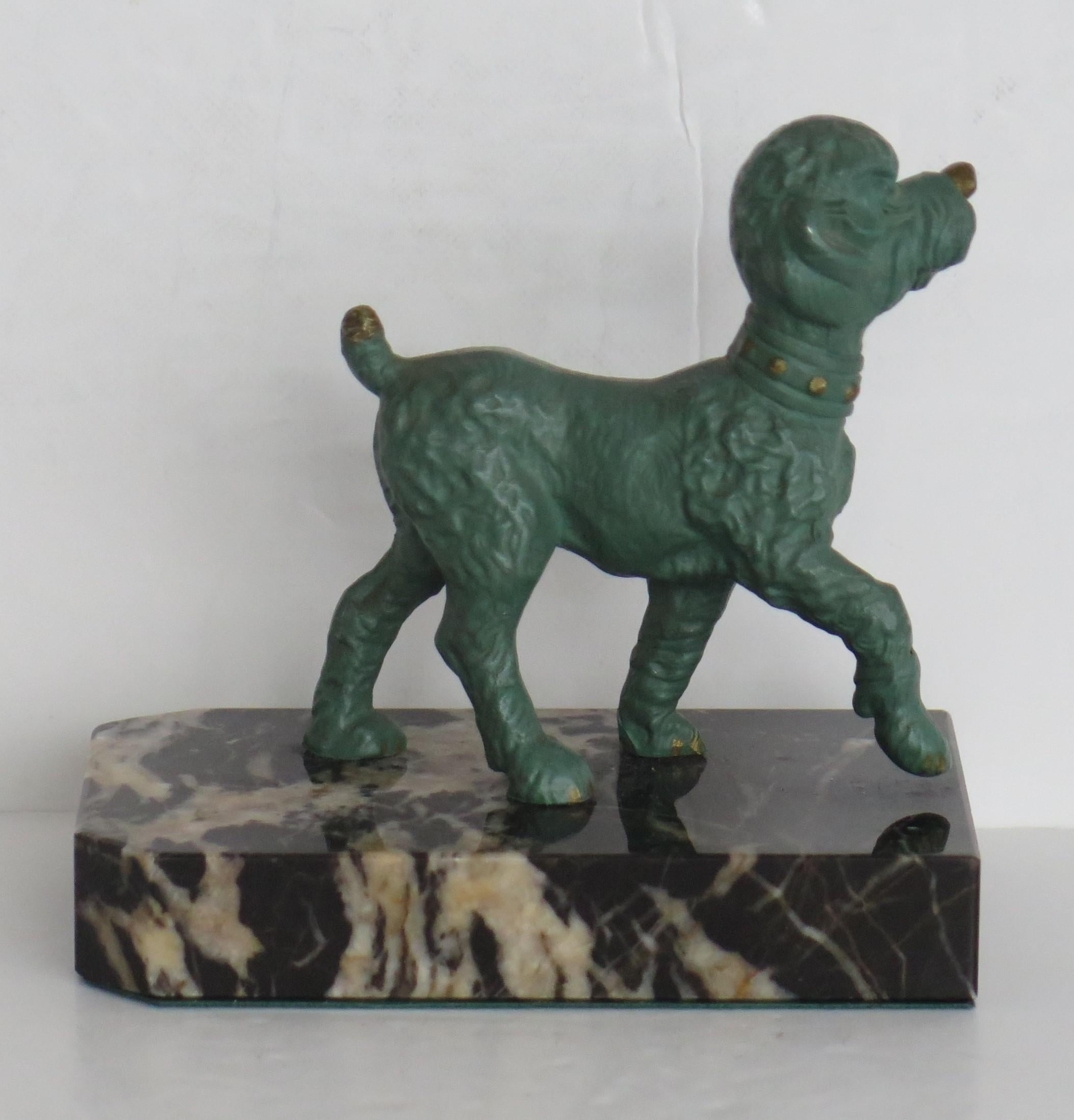 Art Deco Bookends of Poodle Dogs Spelter on Portoro Marble Bases, circa 1930 1
