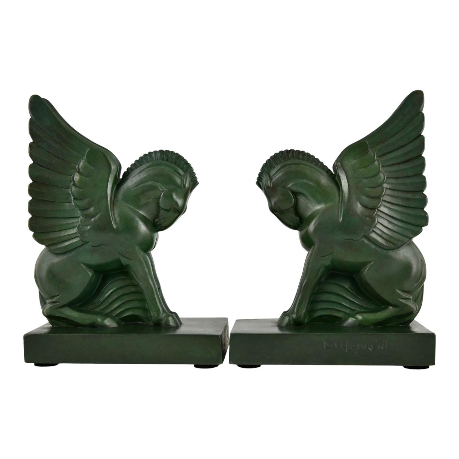 Patinated Art Deco bookends PEGASUS by G.H. Laurent France 1930, winged horses. For Sale