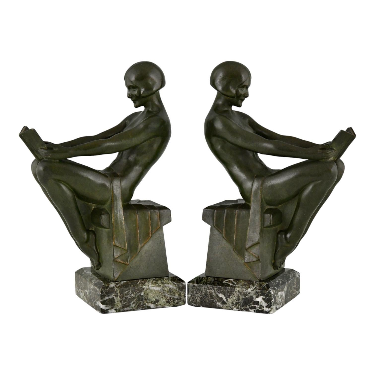 Art Deco bookends reading nudes Delassement by Max Le Verrier.
Patinated Art Metal on green marble base.
France ca. 1930.
With COA. 

This model is illustrated in:
Max le Verrier, un esprit Art Déco.  
Bénédicte Wattel & Damien Blanchet Le Verrier.