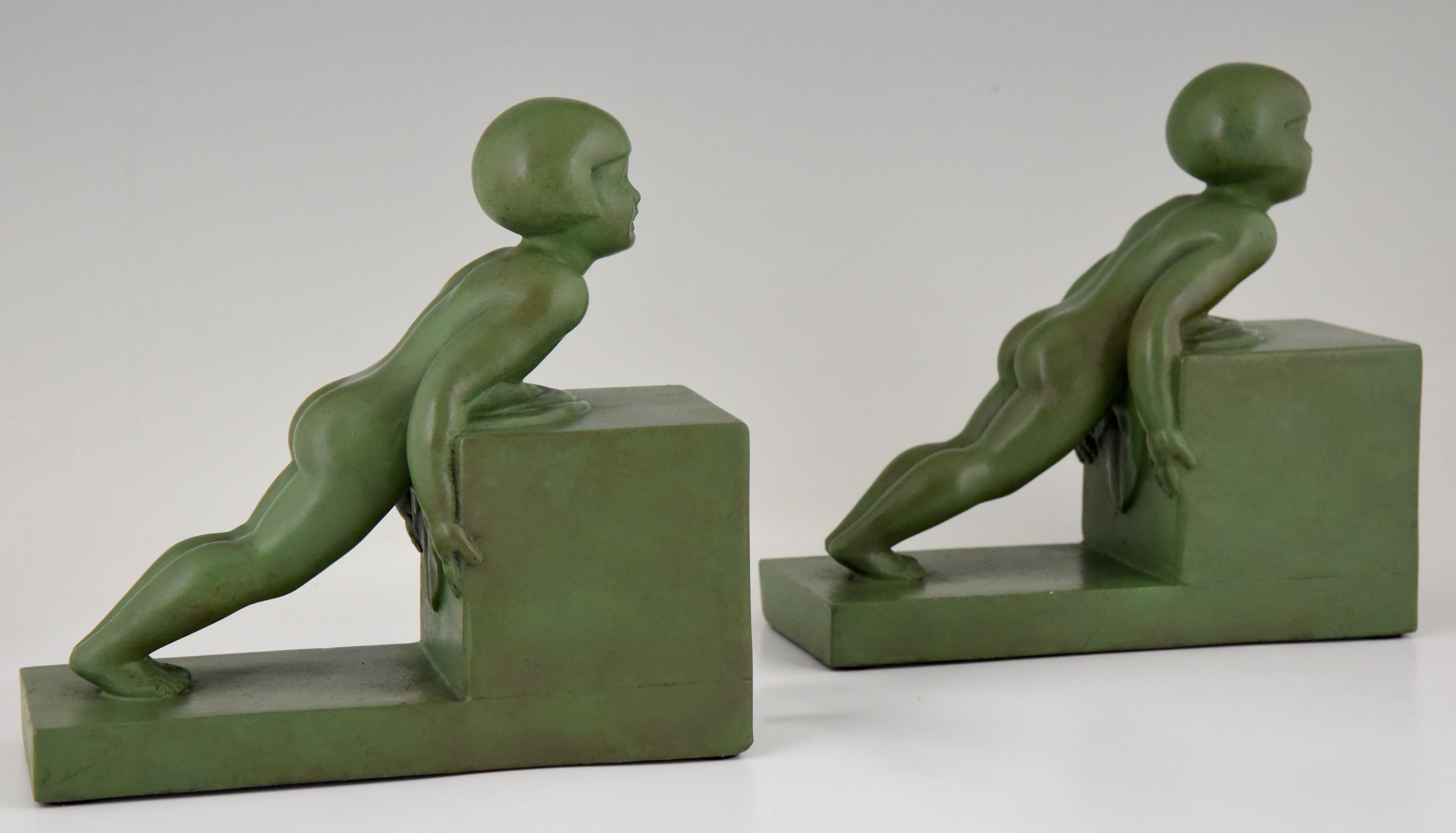 Art Deco Bookends with Children Signed Janle, France, 1930 4