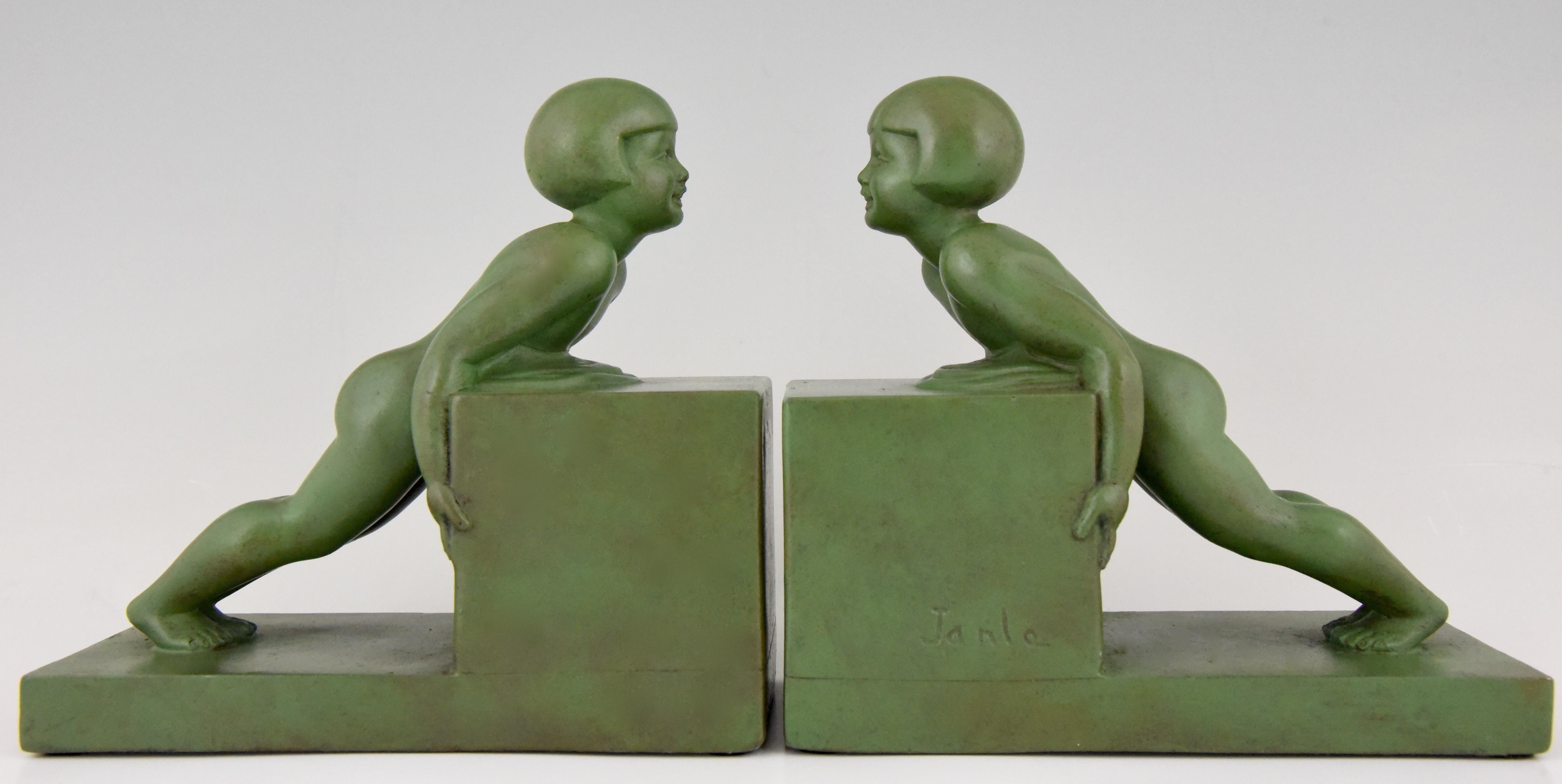 Art Deco Bookends with Children Signed Janle, France, 1930 5