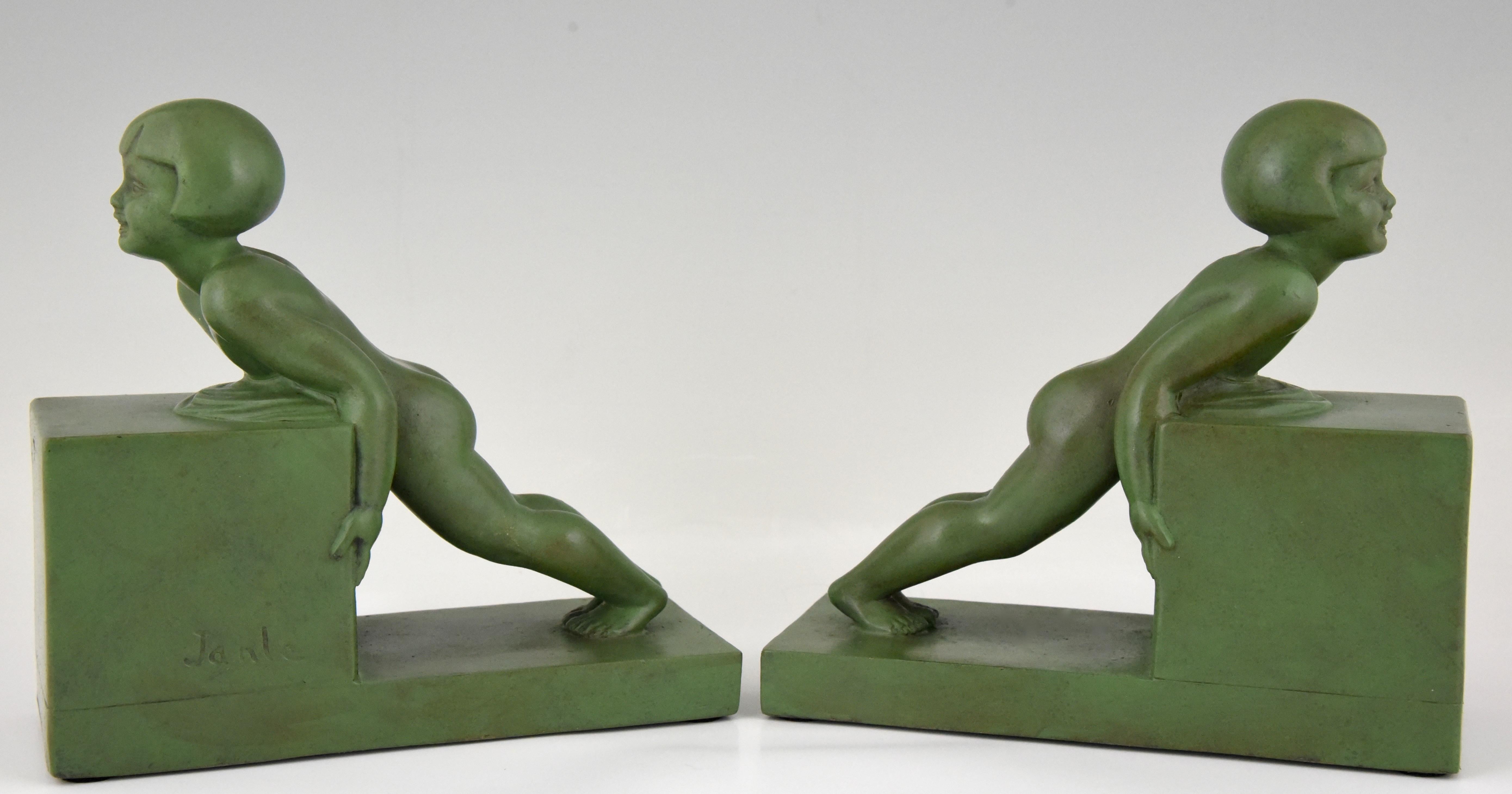 French Art Deco Bookends with Children Signed Janle, France, 1930