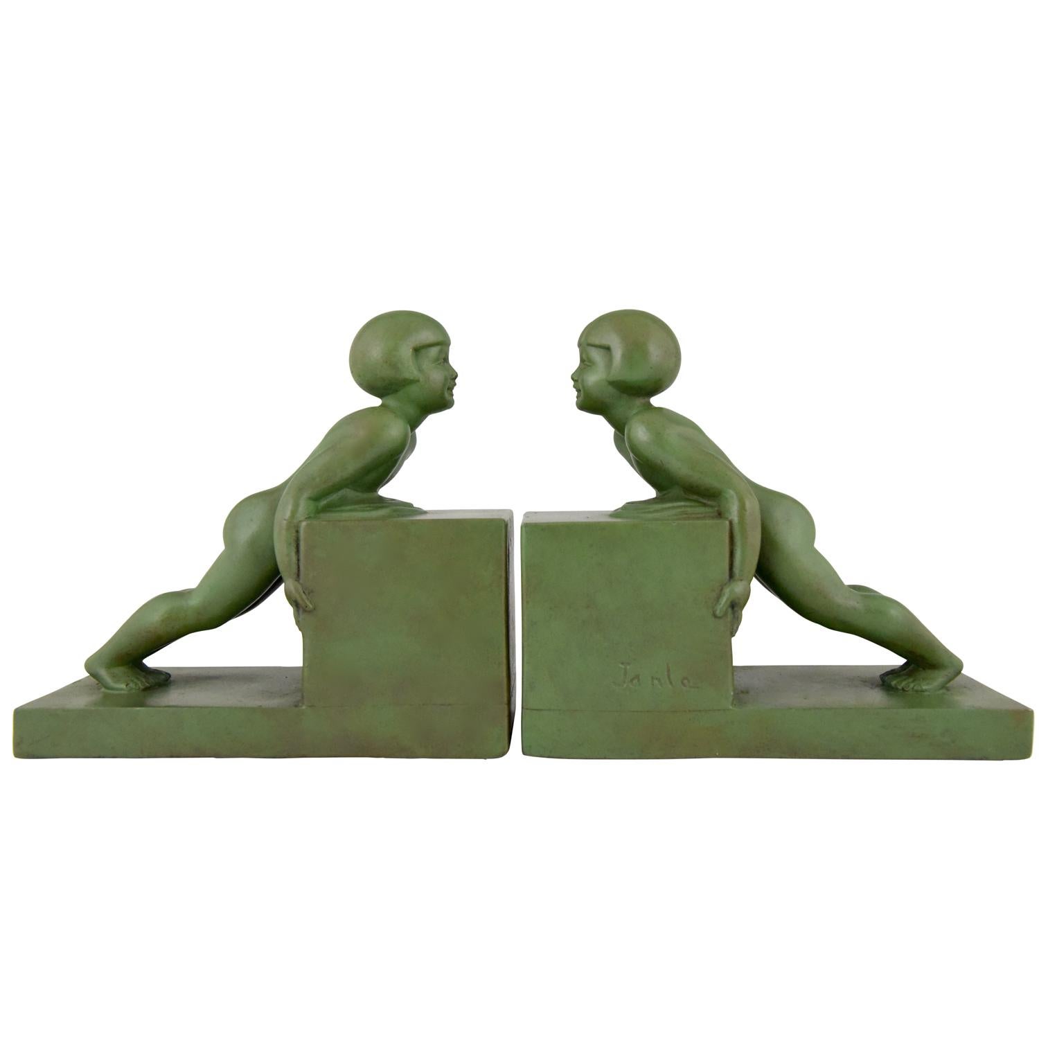 Art Deco Bookends with Children Signed Janle, France, 1930