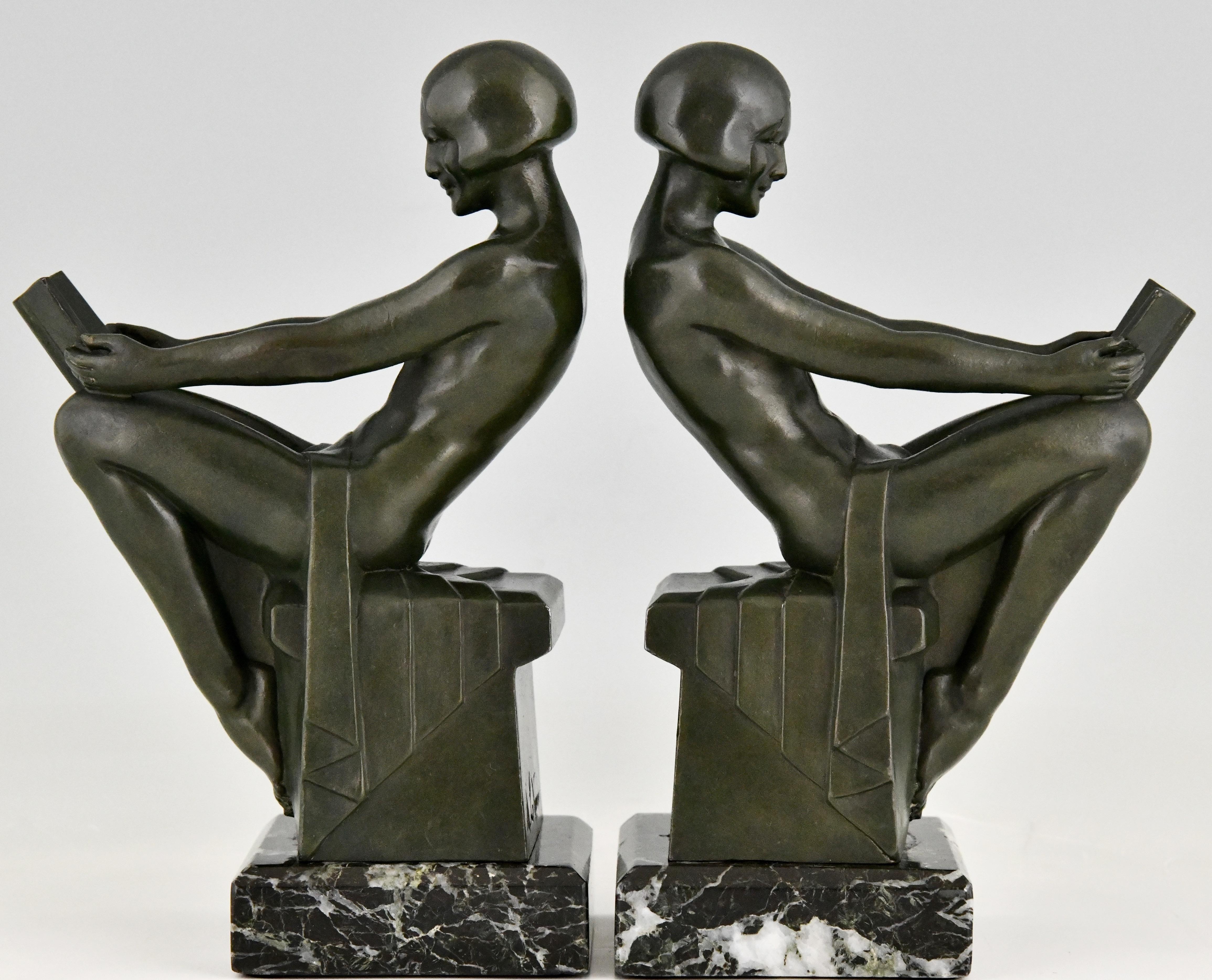Art Deco bookends with reading nudes Delassement. By Max Le Verrier. Patinated Art Metal on green marble base. France c. 1930.

Literature:
Statuettes of the Art Deco period by Alberto Shayo. Art Deco sculpture by Victor Arwas, Academy. Bronzes,