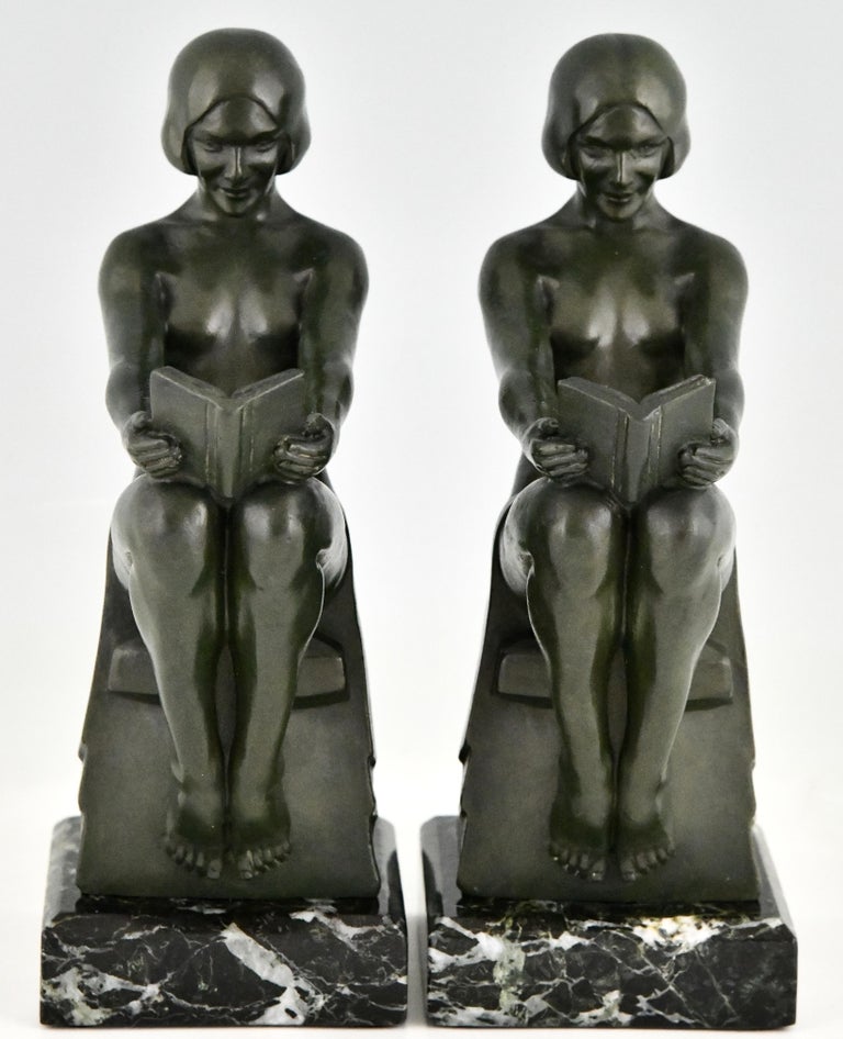 Patinated Art Deco Bookends with Reading Nudes Delassement by Max Le Verrier France 1930