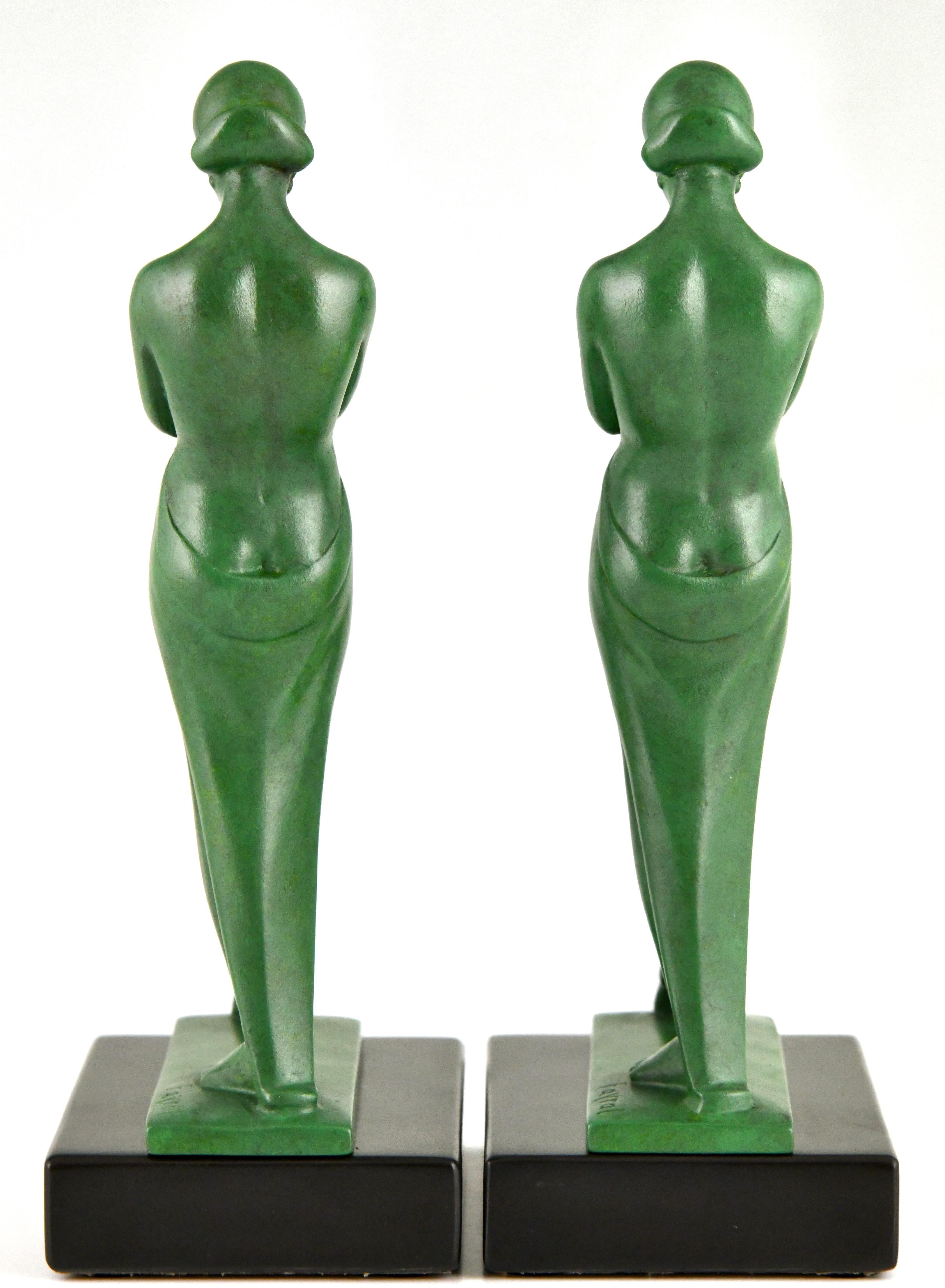 Metal Art Deco bookends with standing nudes Meditation by Fayral Pierre le Faguays For Sale