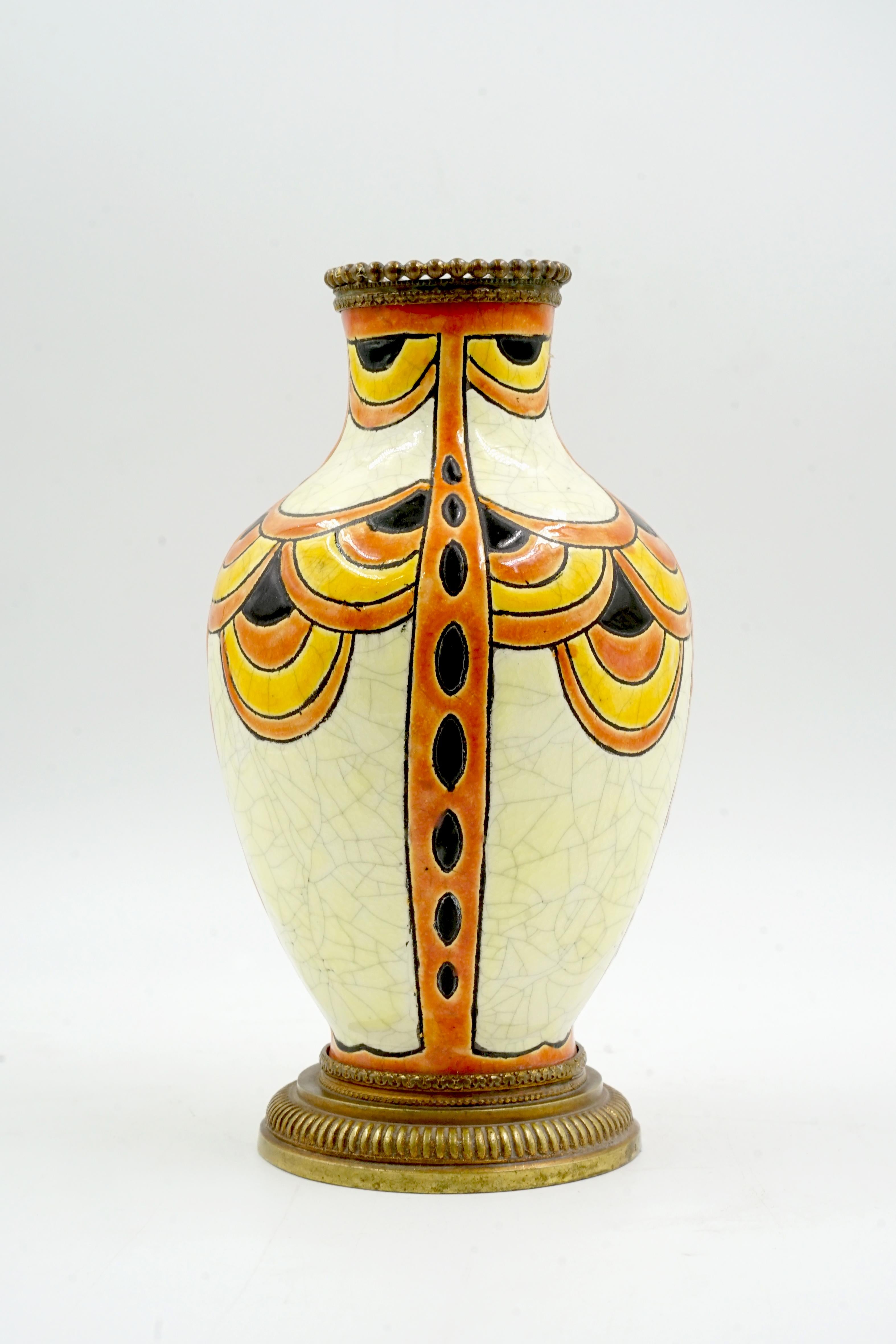 Art Deco Bosch Ceramics by Charles Catteau
Designer Charles Catteau
Origin Belgium Circa 1930
Materials: ceramic and bronze rings on the base and mouth
Excellent condition and without restorations
enamelled and hand-painted geometric motifs
Signed