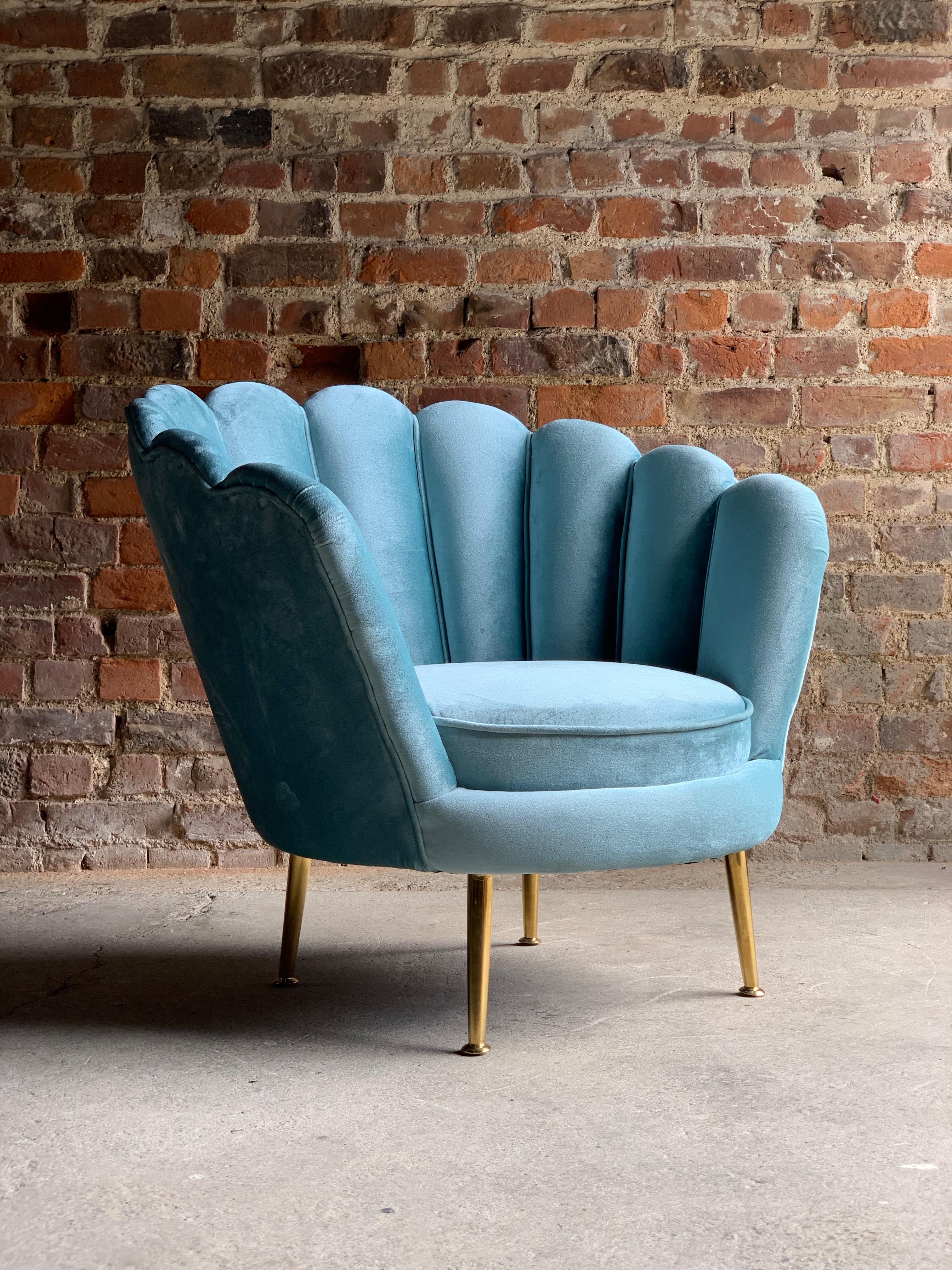 Art Deco Boudoir shell chair in Turquoise velvet 1920s style

Fabulous Art Deco style cocktail shell chair upholstered in deep turquoise velvet, standing on tapered brass legs, Inspired by the retro cinema seats of the Art Deco era of the roaring