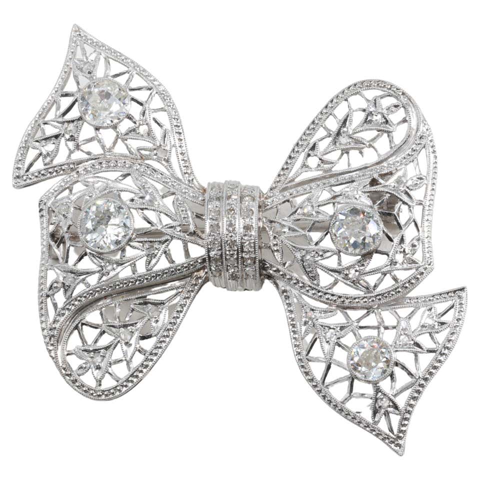 Art Deco Diamond Bow Brooch in Platinum at 1stDibs