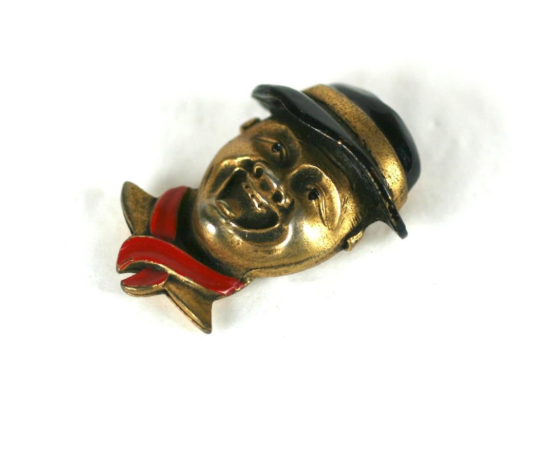 Charming Art Deco Boy Scout Clip with enthusiastic scout, greenish gold finish with enamel accents.   1930's USA.  
1.75