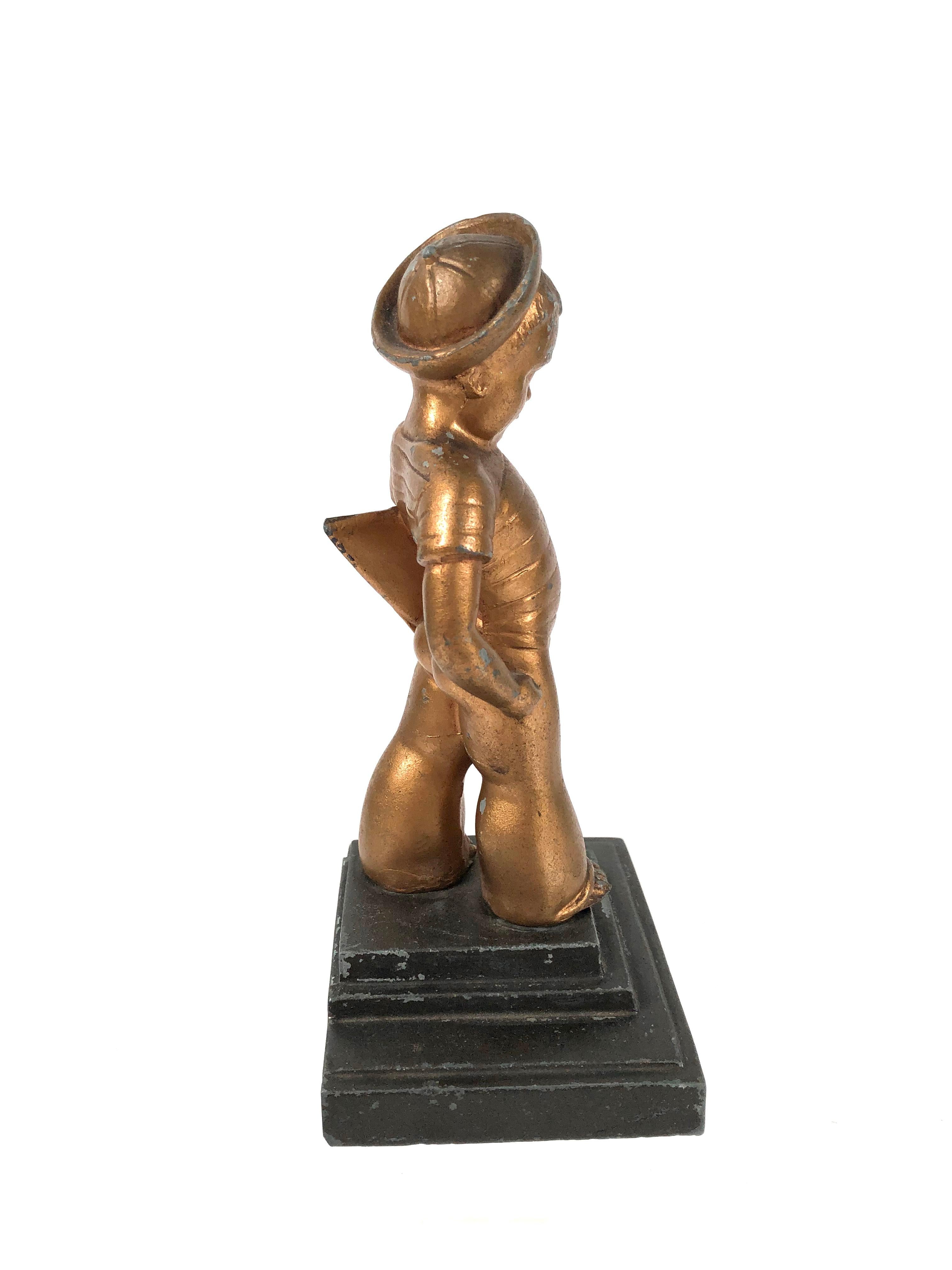 Cast Art Deco Boy with Sailboat Bookend Sculpture