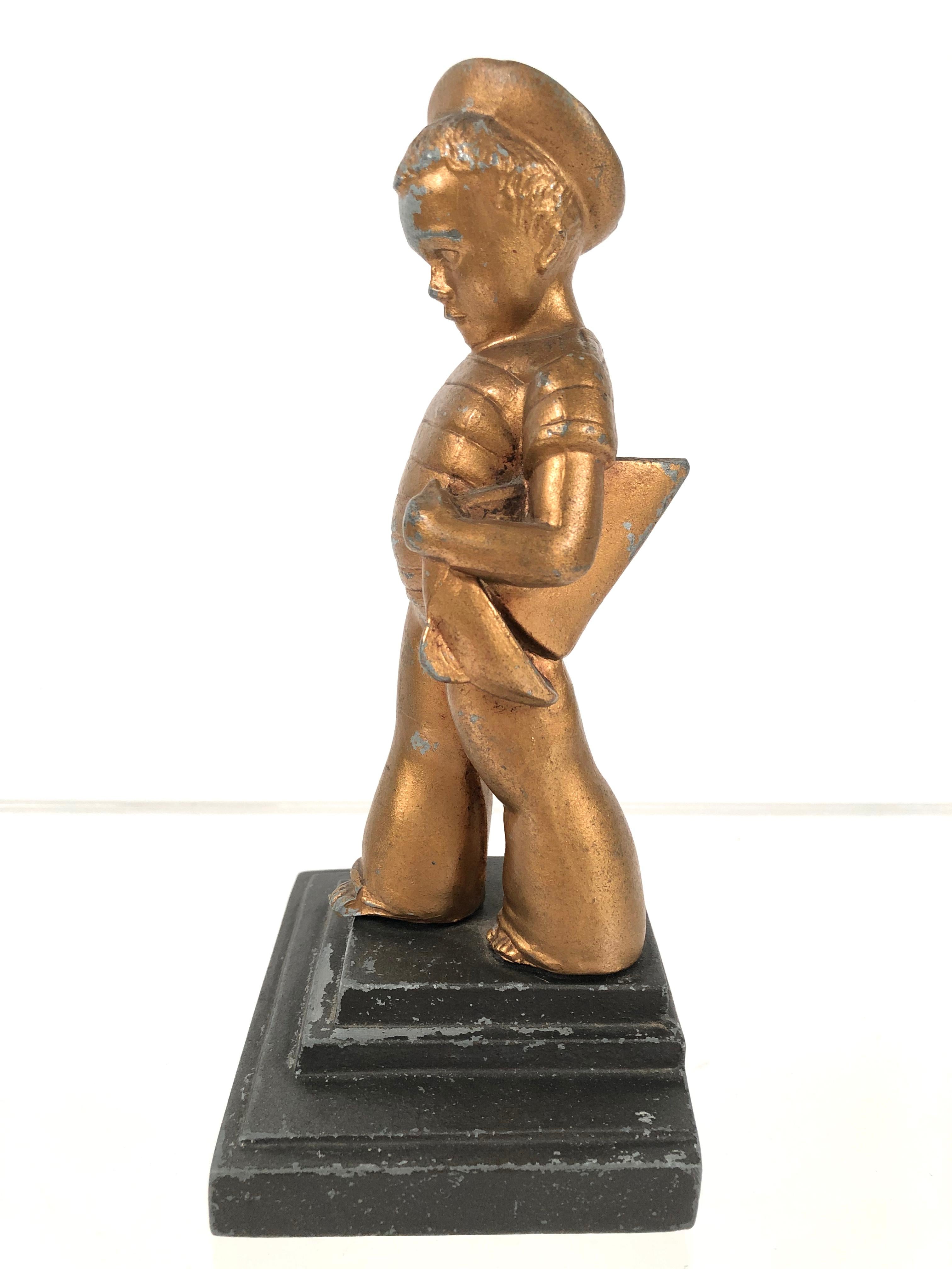 Art Deco Boy with Sailboat Bookend Sculpture In Good Condition In Essex, MA
