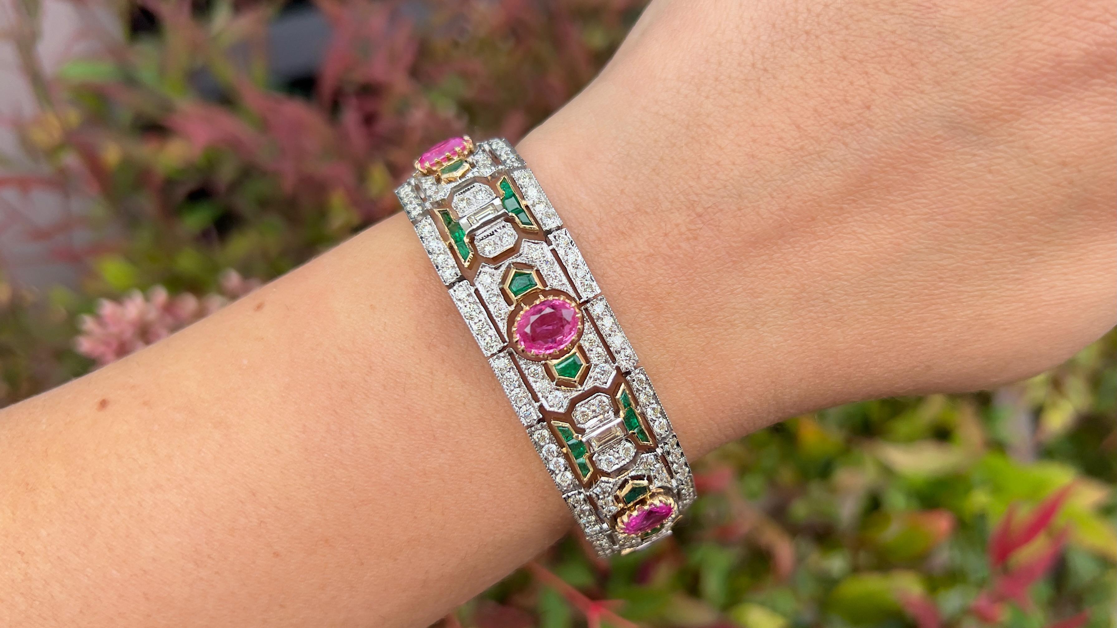 Pink Sapphires = 8.56 Carats
Emeralds = 3 Carats
Diamonds = 8.50 Carats
(Color: F, Clarity: VS)
Metal: 14K Gold
Style: Art Deco
Length: 7 Inches
Jewelry Gift Box Included
