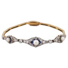 Art-Déco-Armband mit Diamanten und Saphiren, 1920er Jahre.