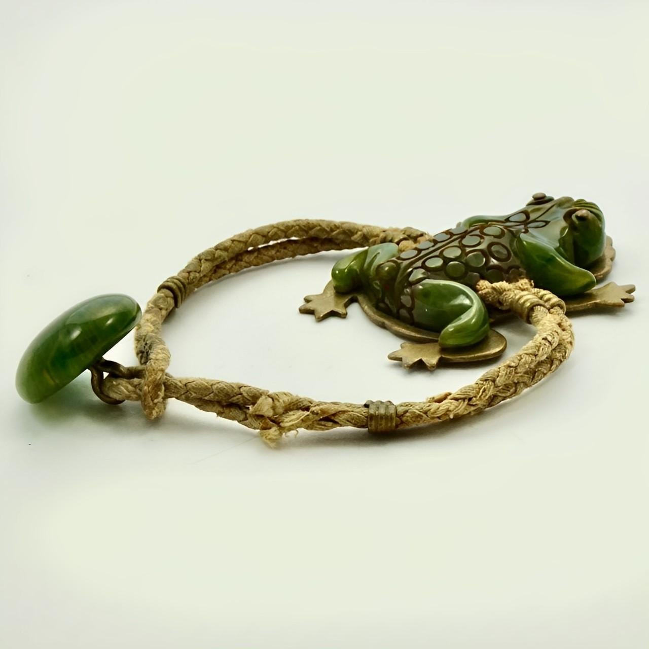 Women's or Men's Art Deco Brass and Carved Bakelite Marbled Green Frog Bracelet with Plaited Cord