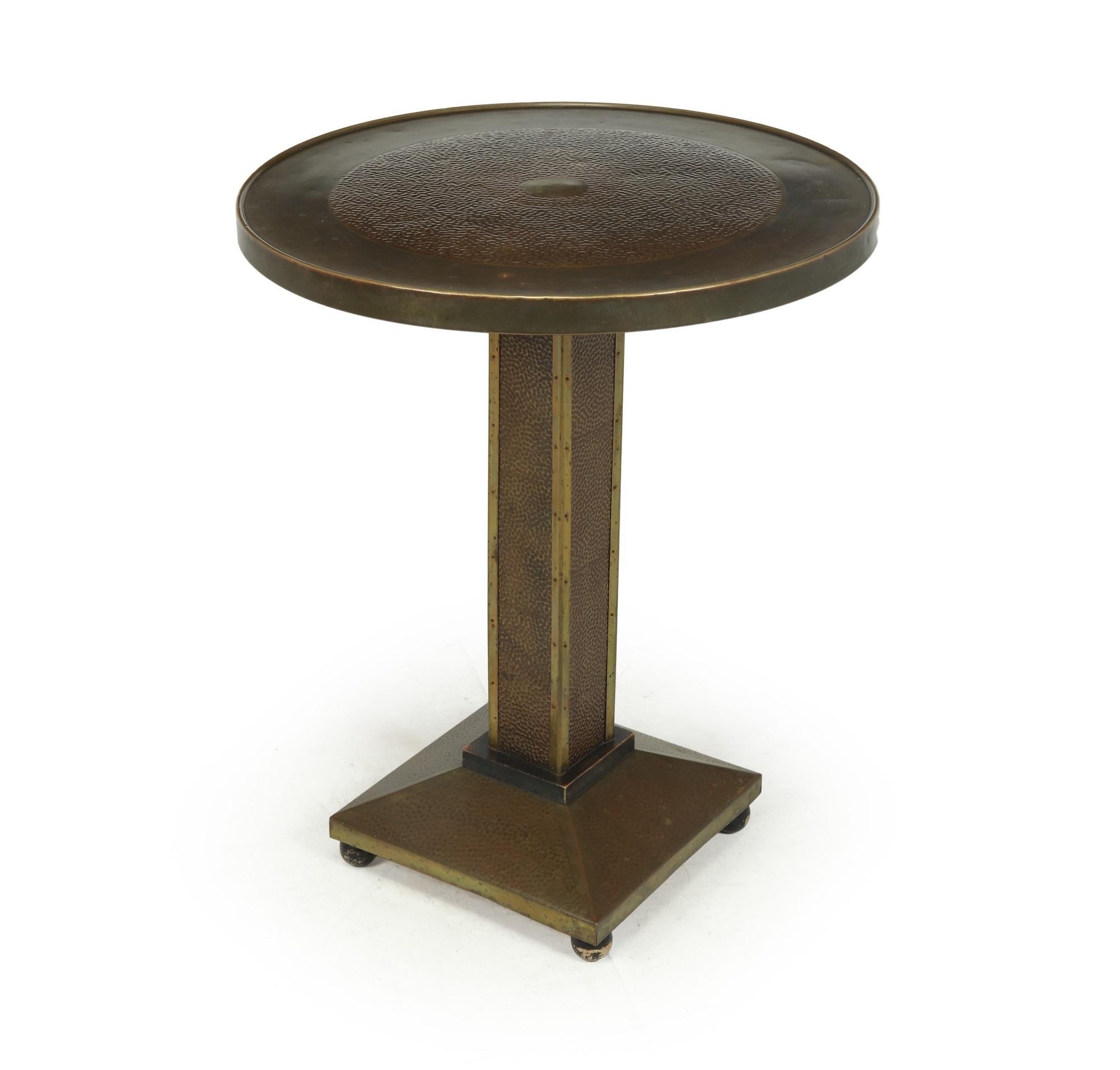 A lovely little super original 1930’s brass and copper wine table from the art deco period, circular beaten copper top with square upright on a sloped square base, retaining original patina and in excellent condition throughout with minor age