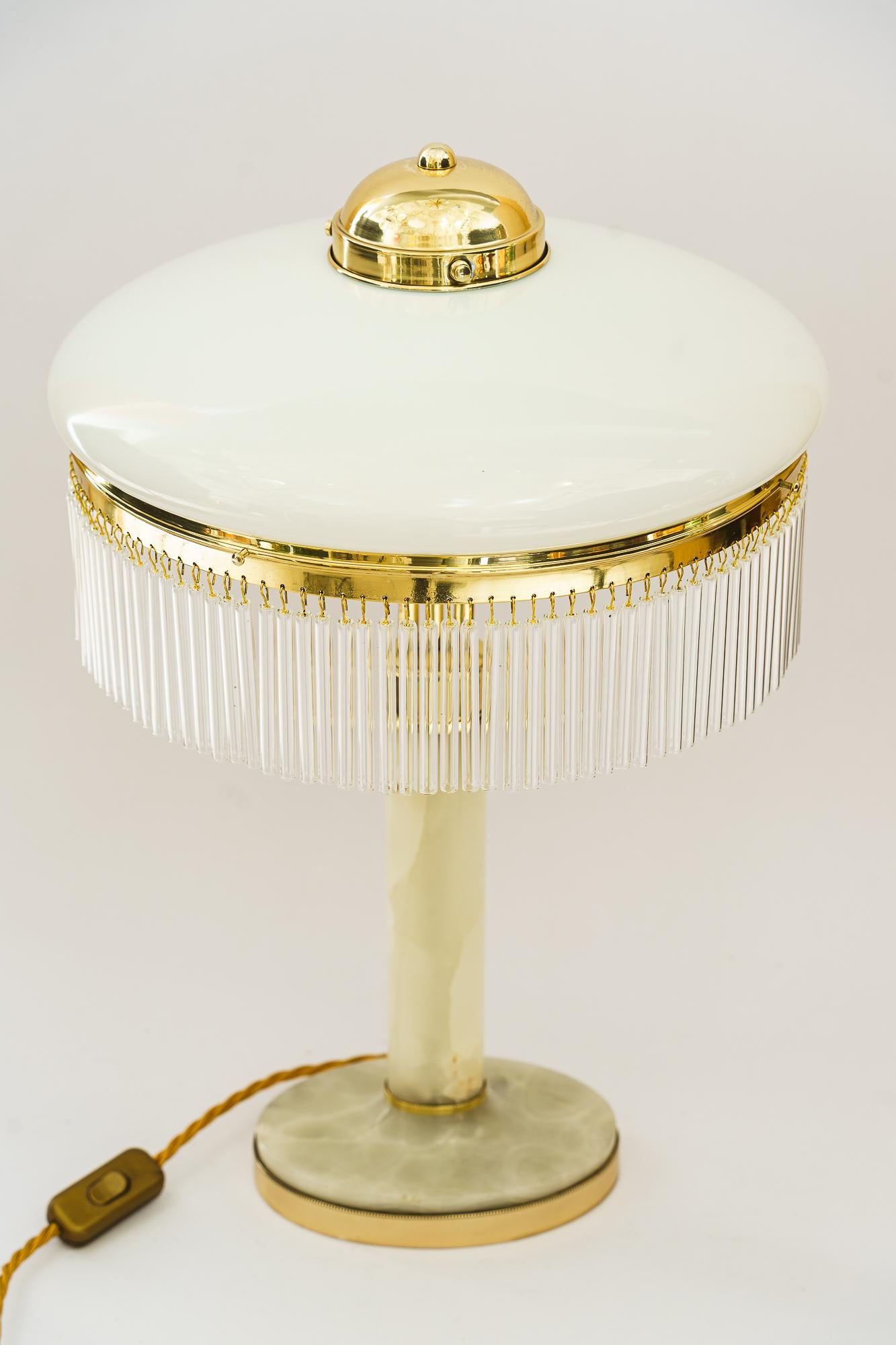 Polished Art Deco Brass and Marble Table lamp with opal glass shade and glass sticks 1920 For Sale