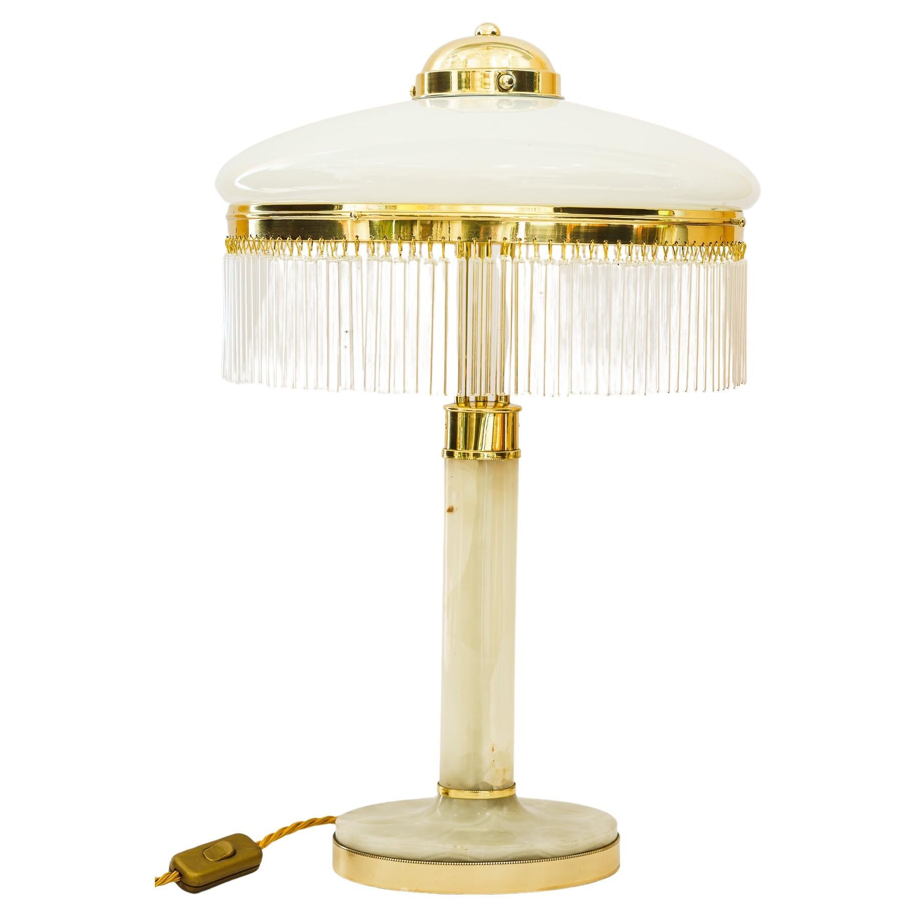 Art Deco Brass and Marble Table lamp with opal glass shade and glass sticks 1920