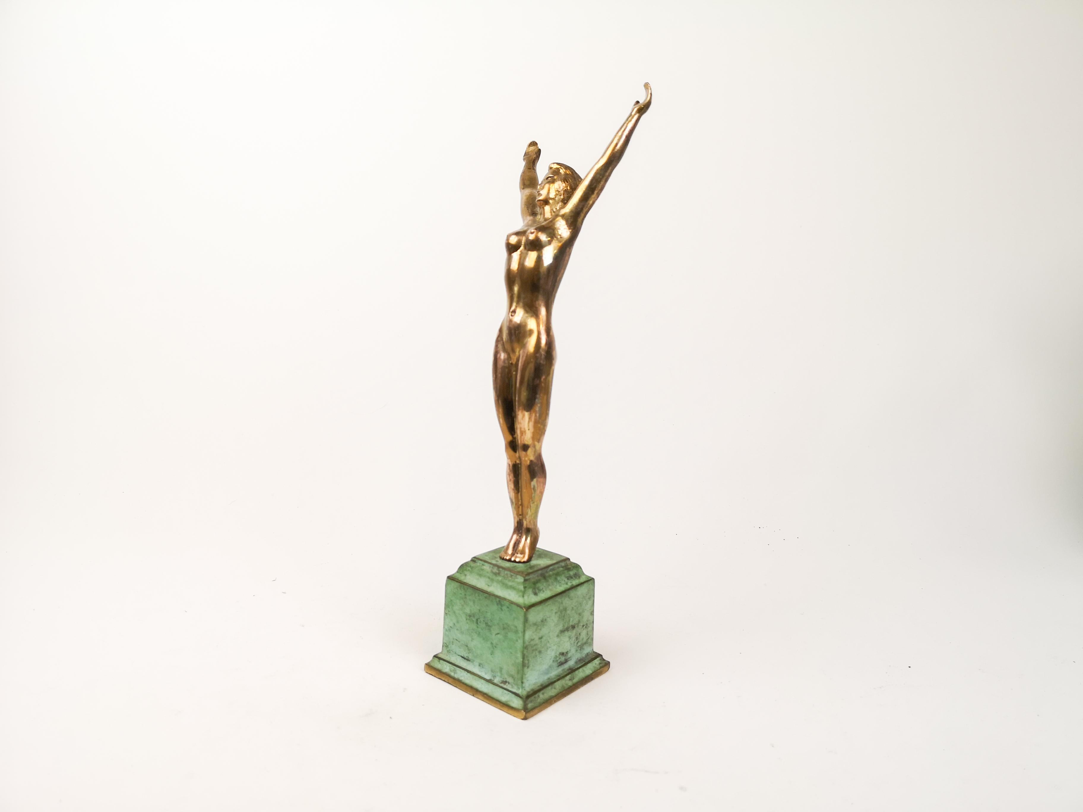 A wonderful brass Art Deco figurine made by Axel Ebbe for P.Ibsens Widow. Ebbe, Axel (1868-1941) Sweden, 